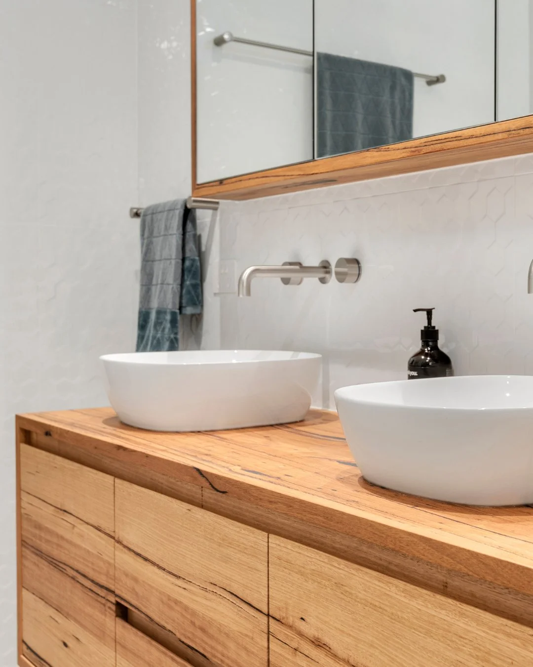 Thanks to our client for sending through this beautiful image of their recycled Messmate Iluka vanity and matching mirror cabinet installed. ⁠
⁠
I love the elegance of the timber in a completely white bathroom. ⁠
⁠
#ilukavanity #bomboracustomfurnitur