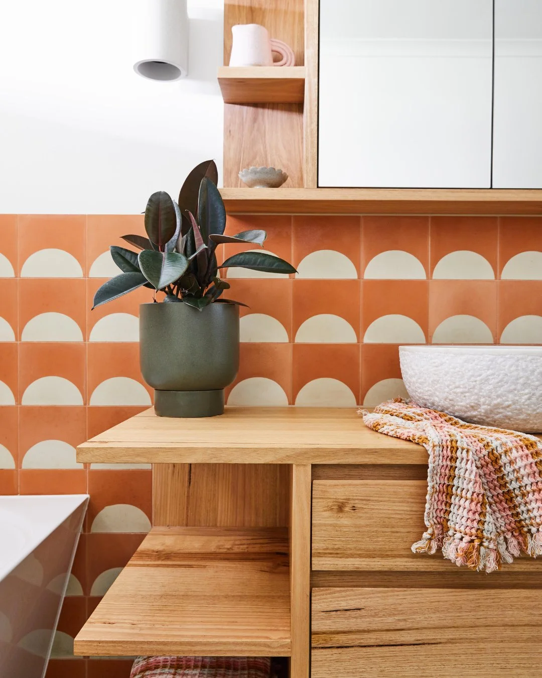 We love it when a client makes one of their designs their own! This beautiful bathroom was created by artist Lauren Barton. Our Iluka vanity and shaving cabinet were taken to whole new heights with the addition of open shelving. ⁠
⁠
The use of colour