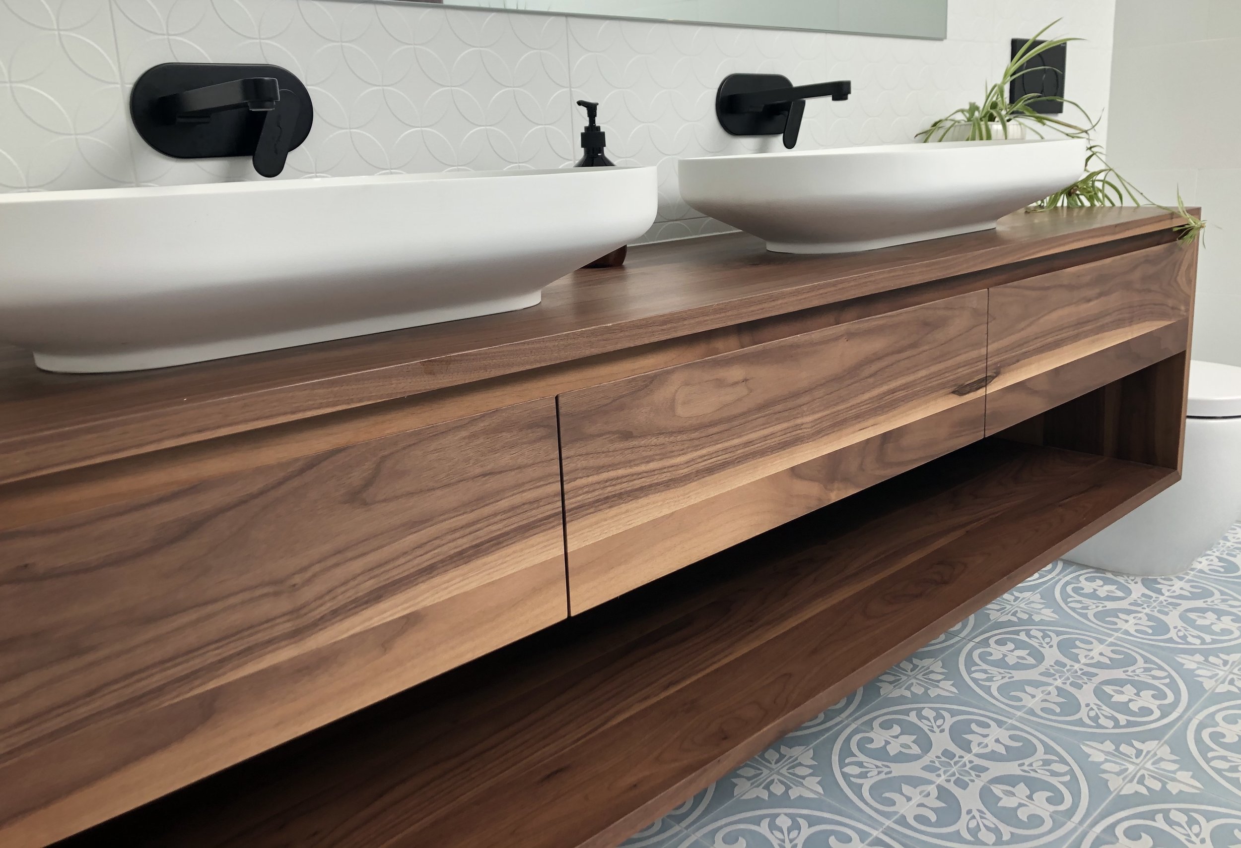 Walnut timber vanity with open shelf