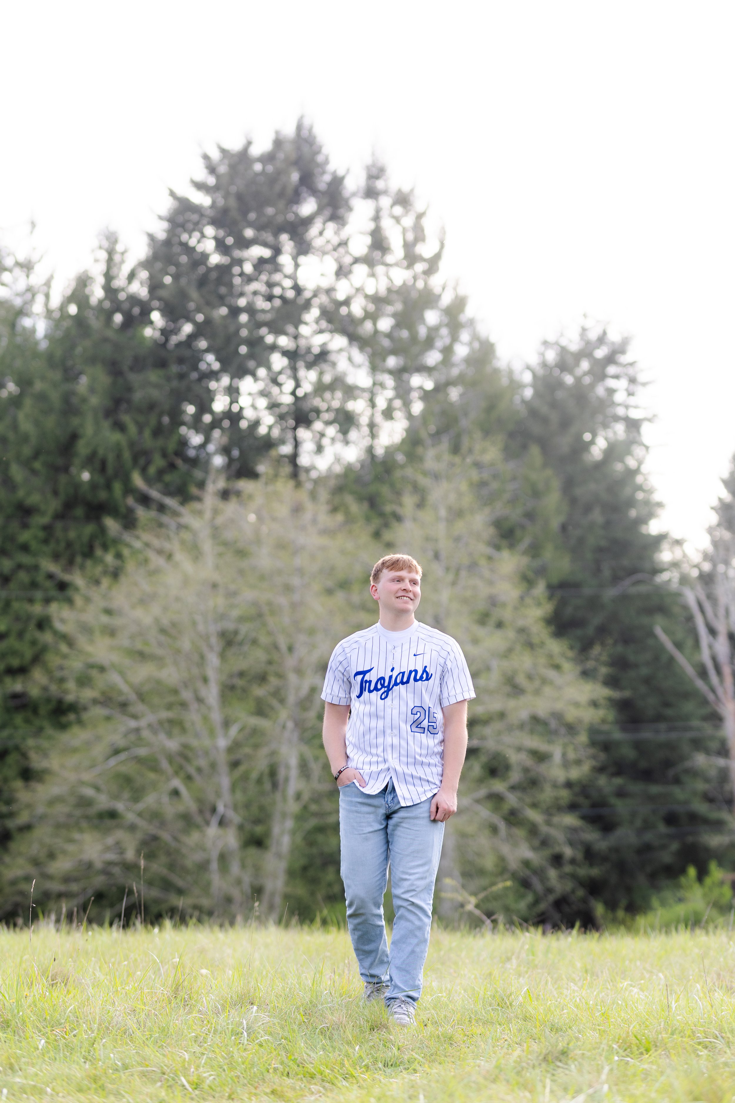 Olympic High School senior picture in baseball jersey