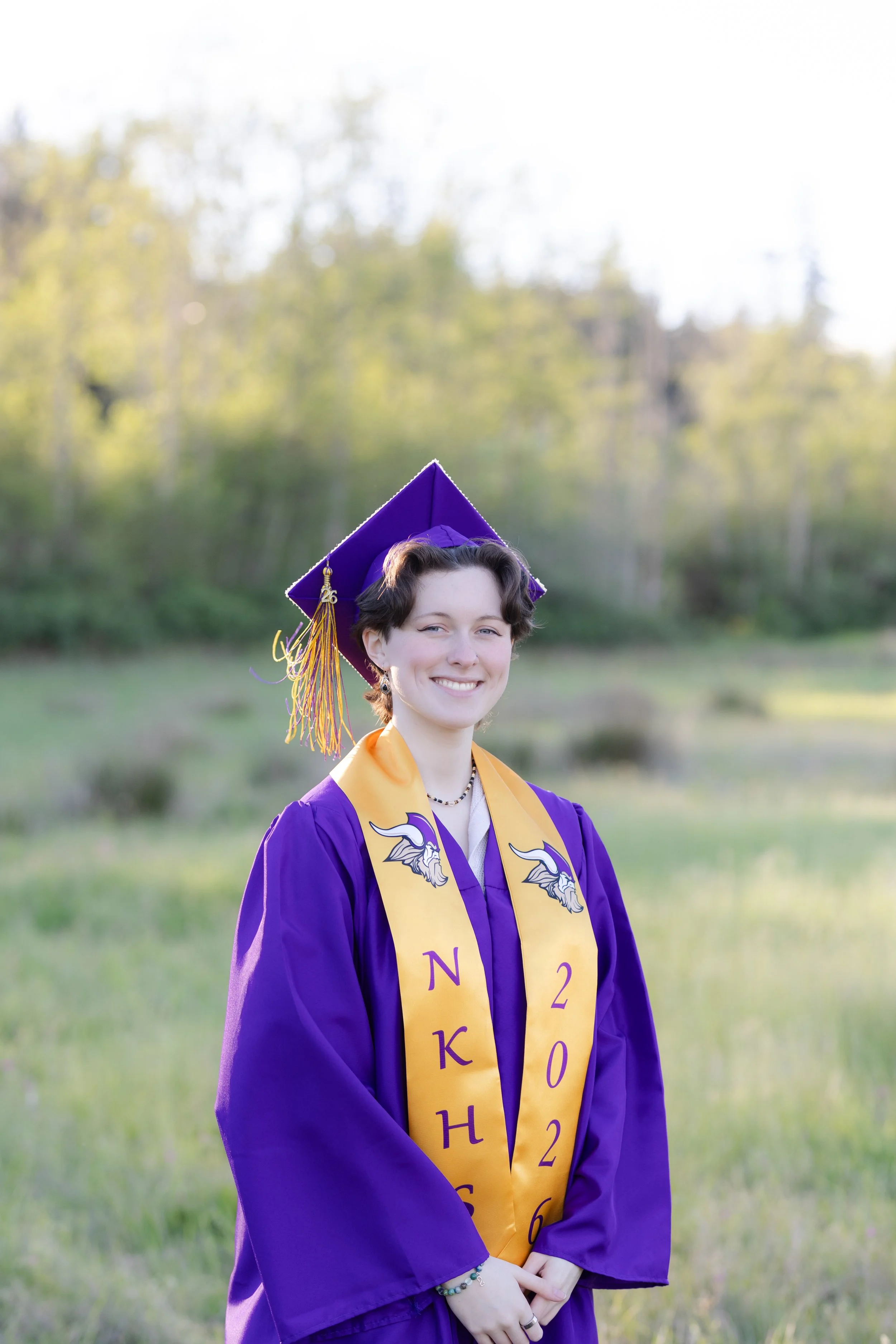 North Kitsap High School graduation picture in cap and gown