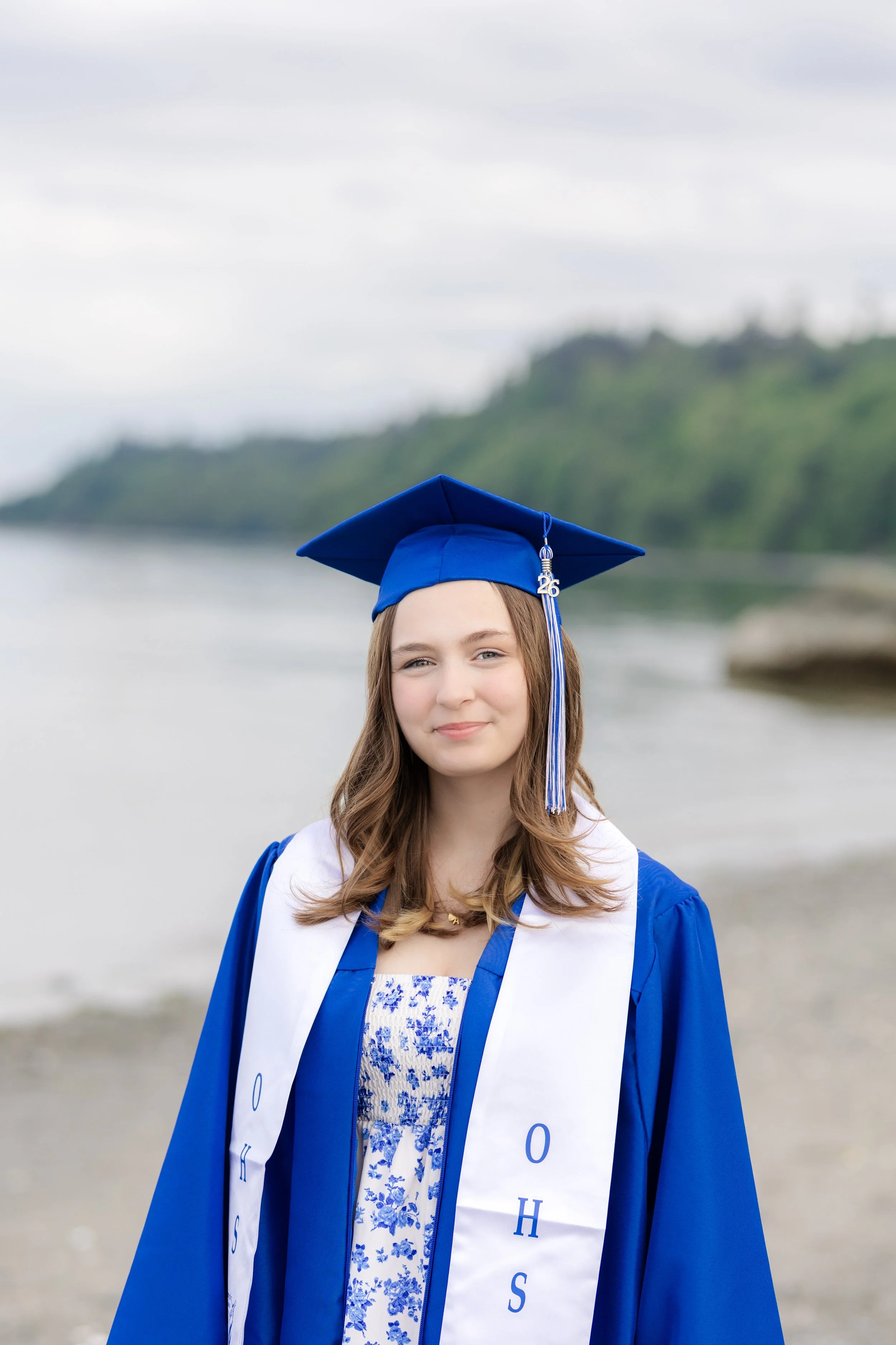 Kitsap senior picture at Point No Point in cap and gown