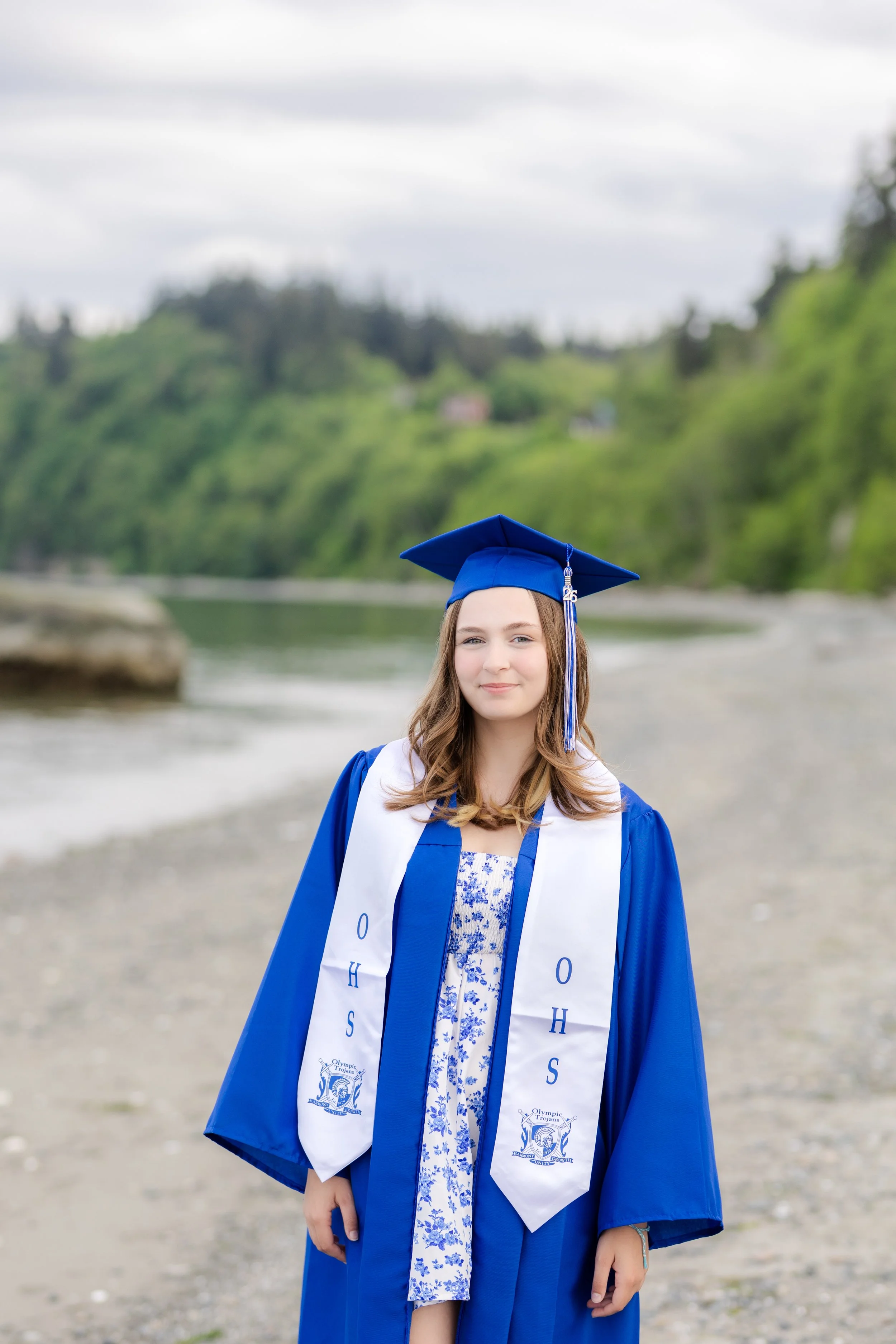 Olympic High School graduation picture on the beach on a cloudy day in Kitsap