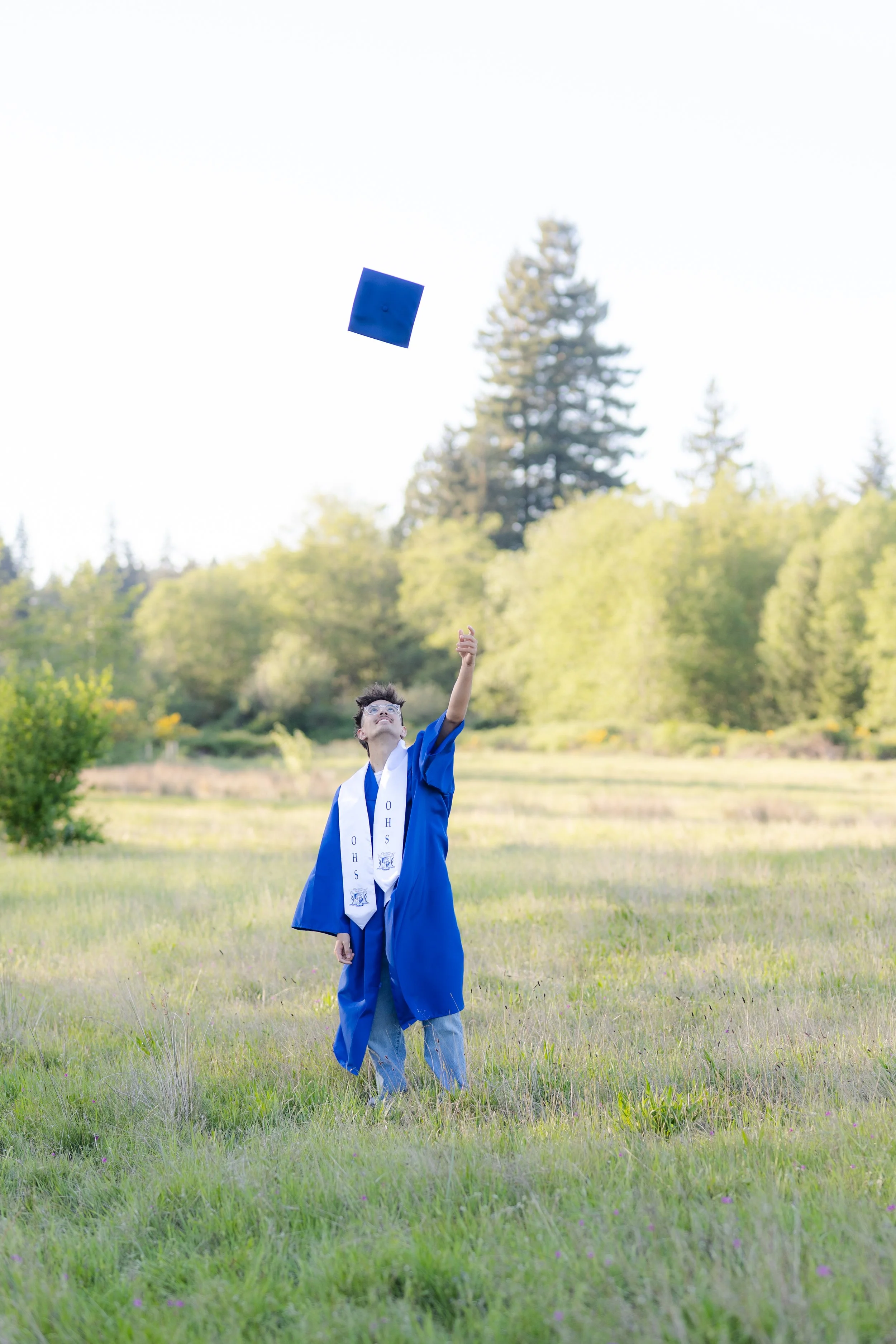 Graduation cap toss photo taken in Silverdale, Washington