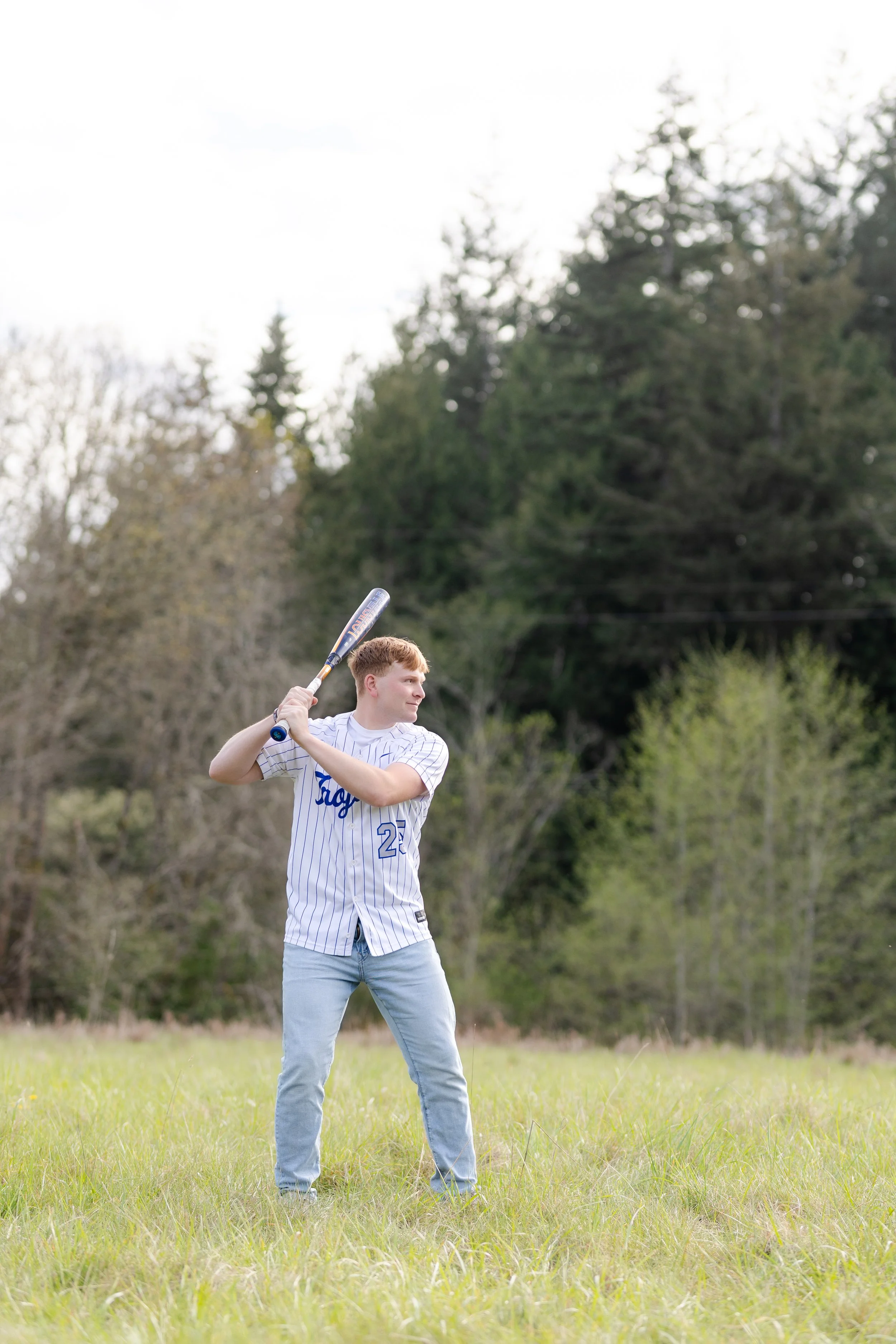 Olympic Trojan senior picture with baseball bat