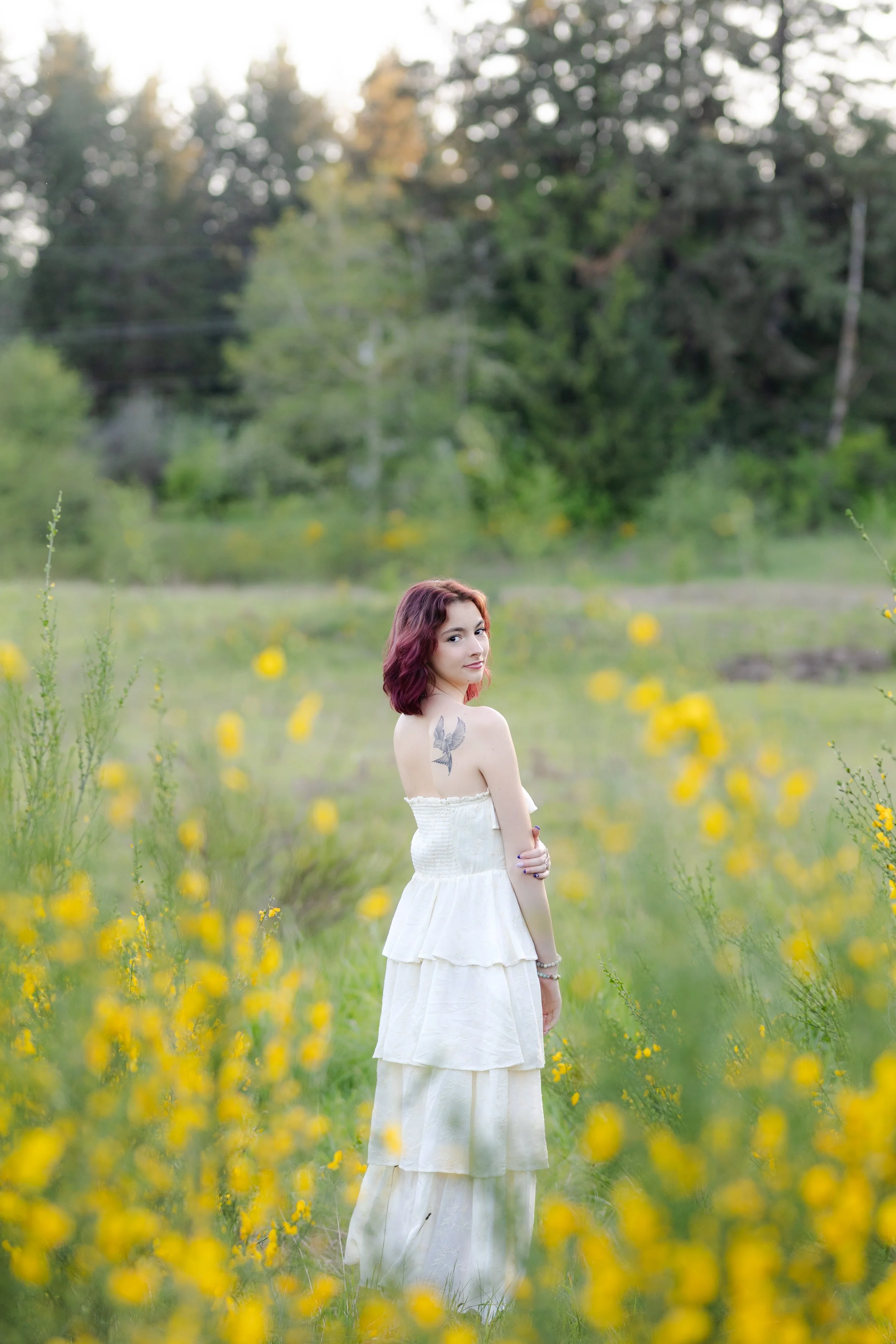 Washington senior photo focused on the senior's tattoo on their shoulder