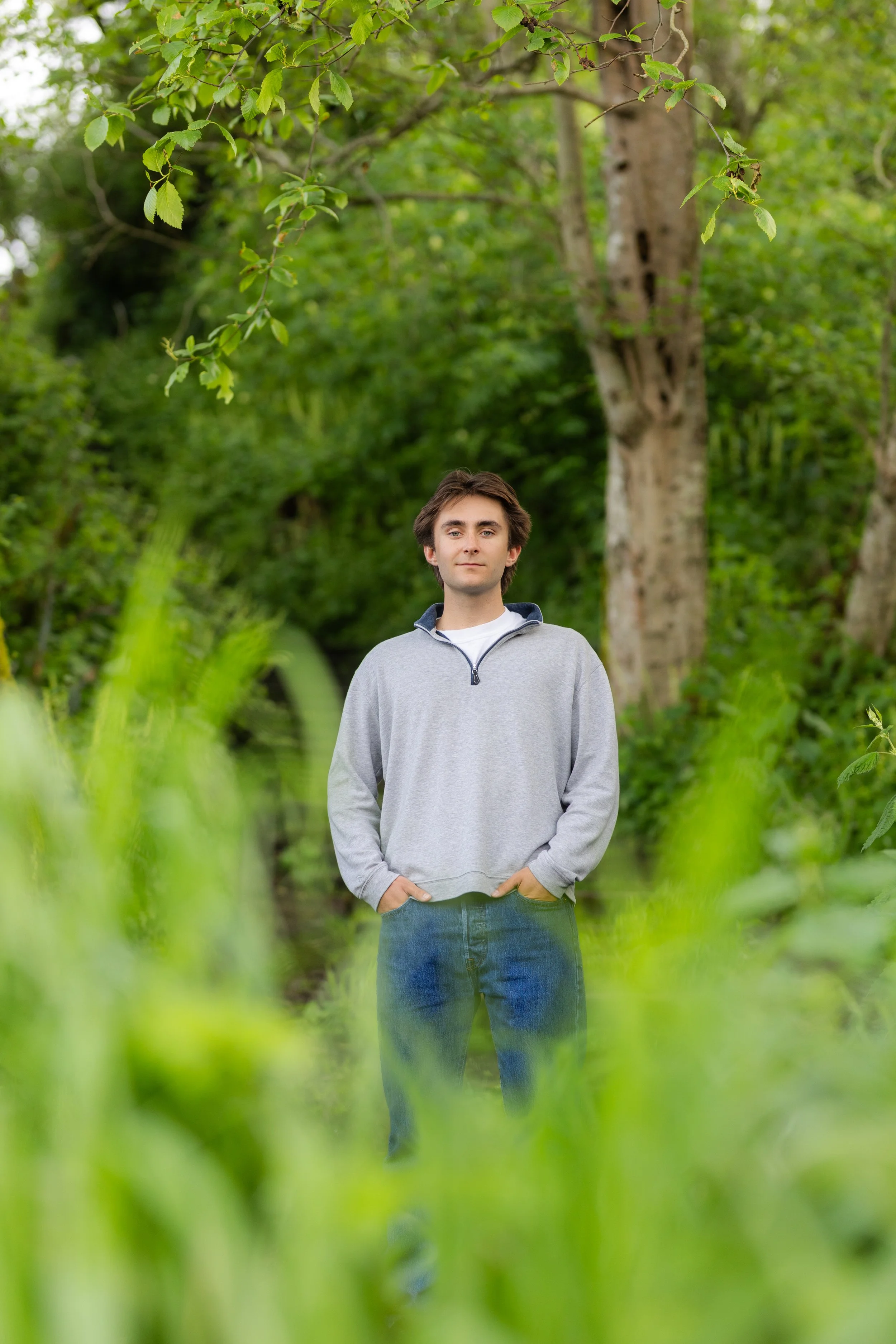 Forest senior picture of a boy in Washington State