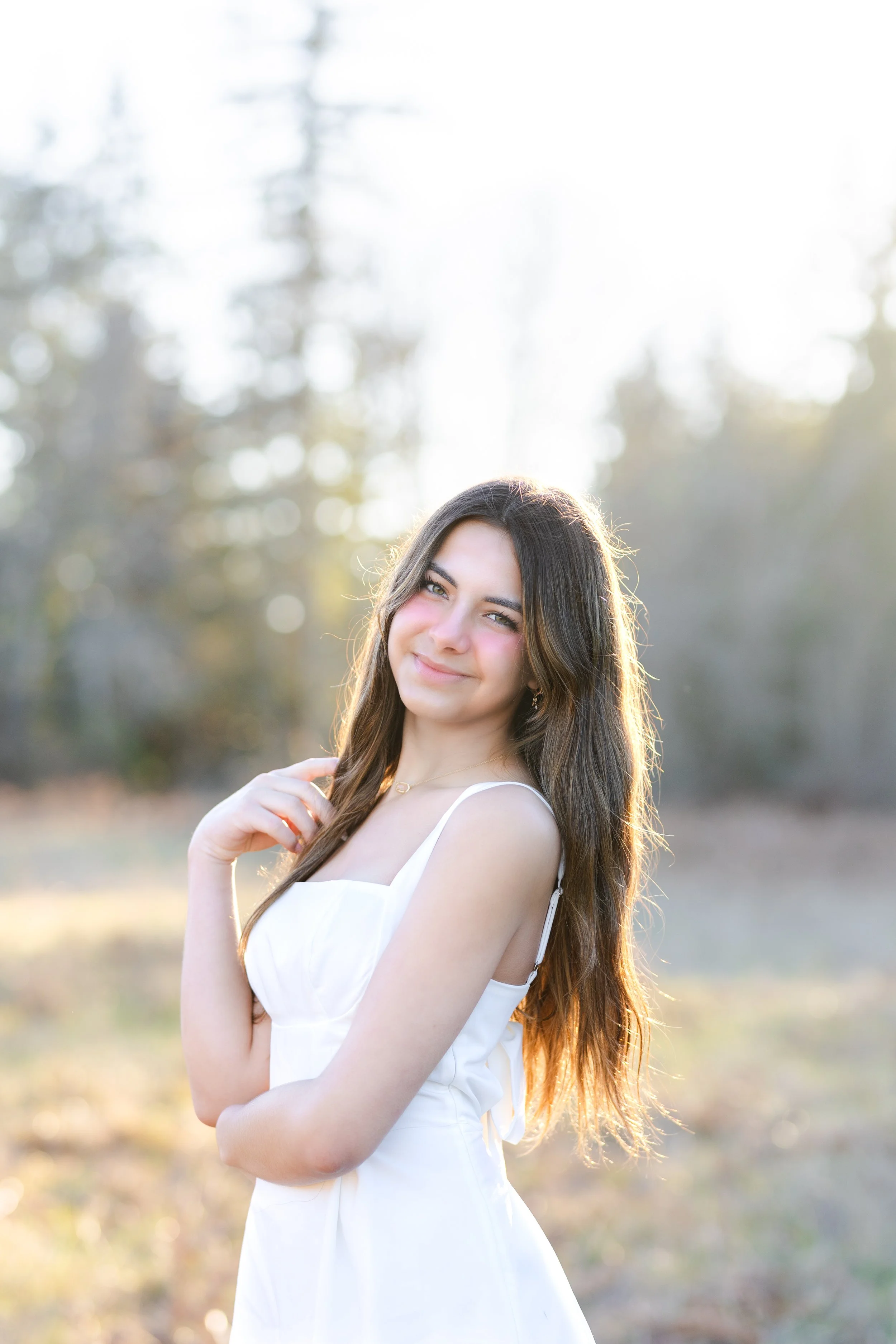 Kitsap senior picture in a sunny field in winter in Port Orchard
