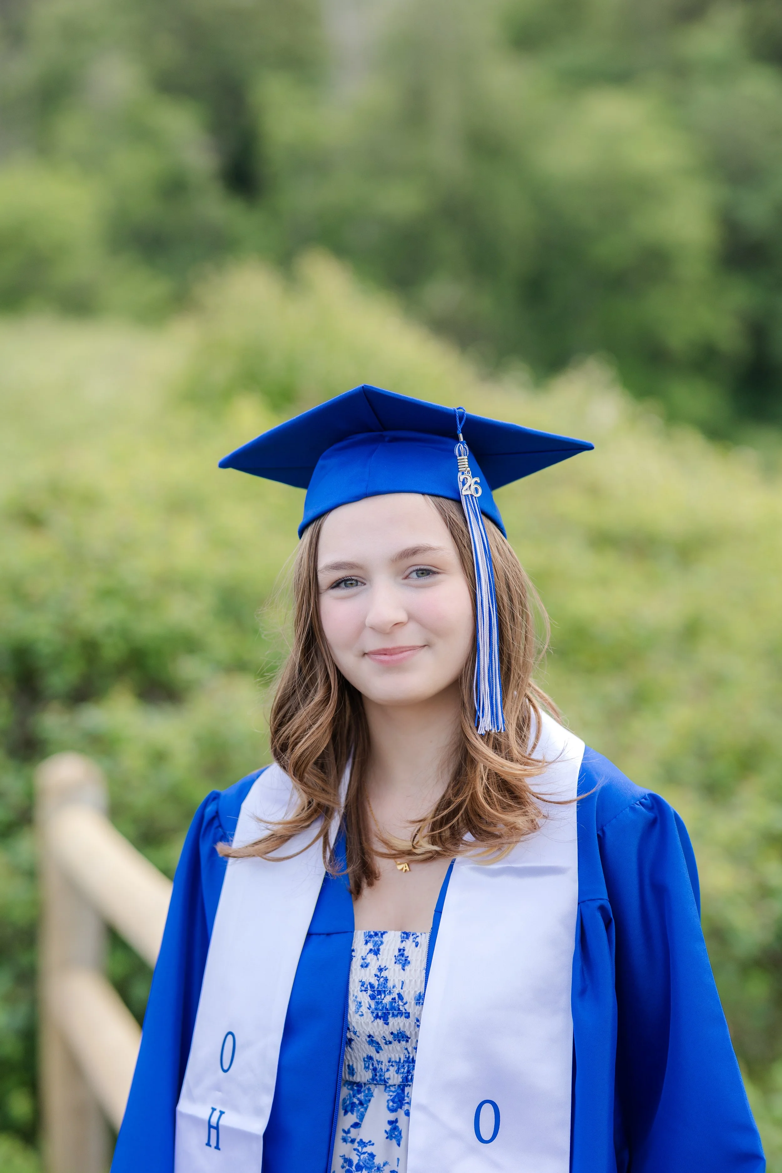 Senior picture in cap and gown in Kitsap County, WA