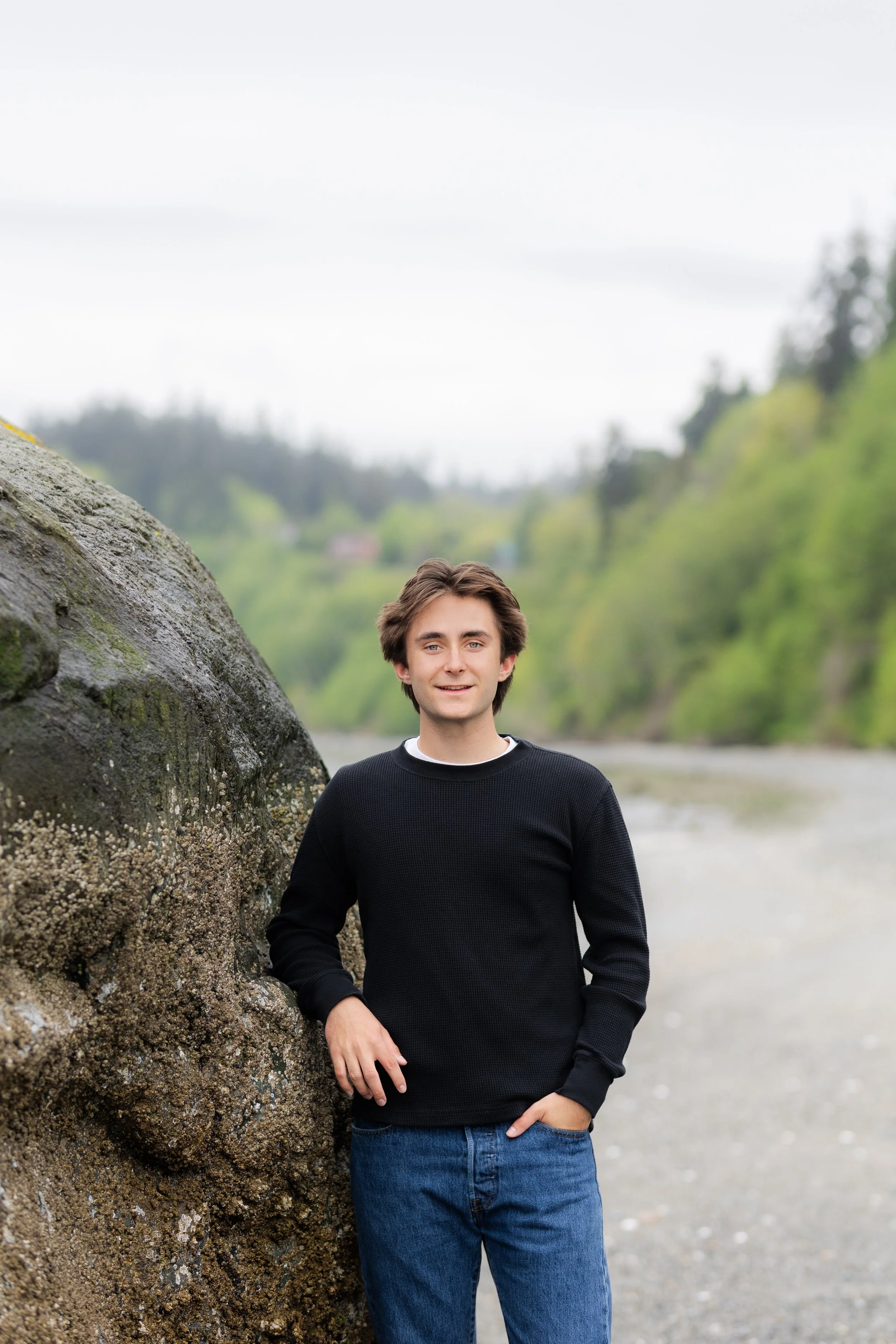 Senior picture of a boy at Point No Point taken in the spring