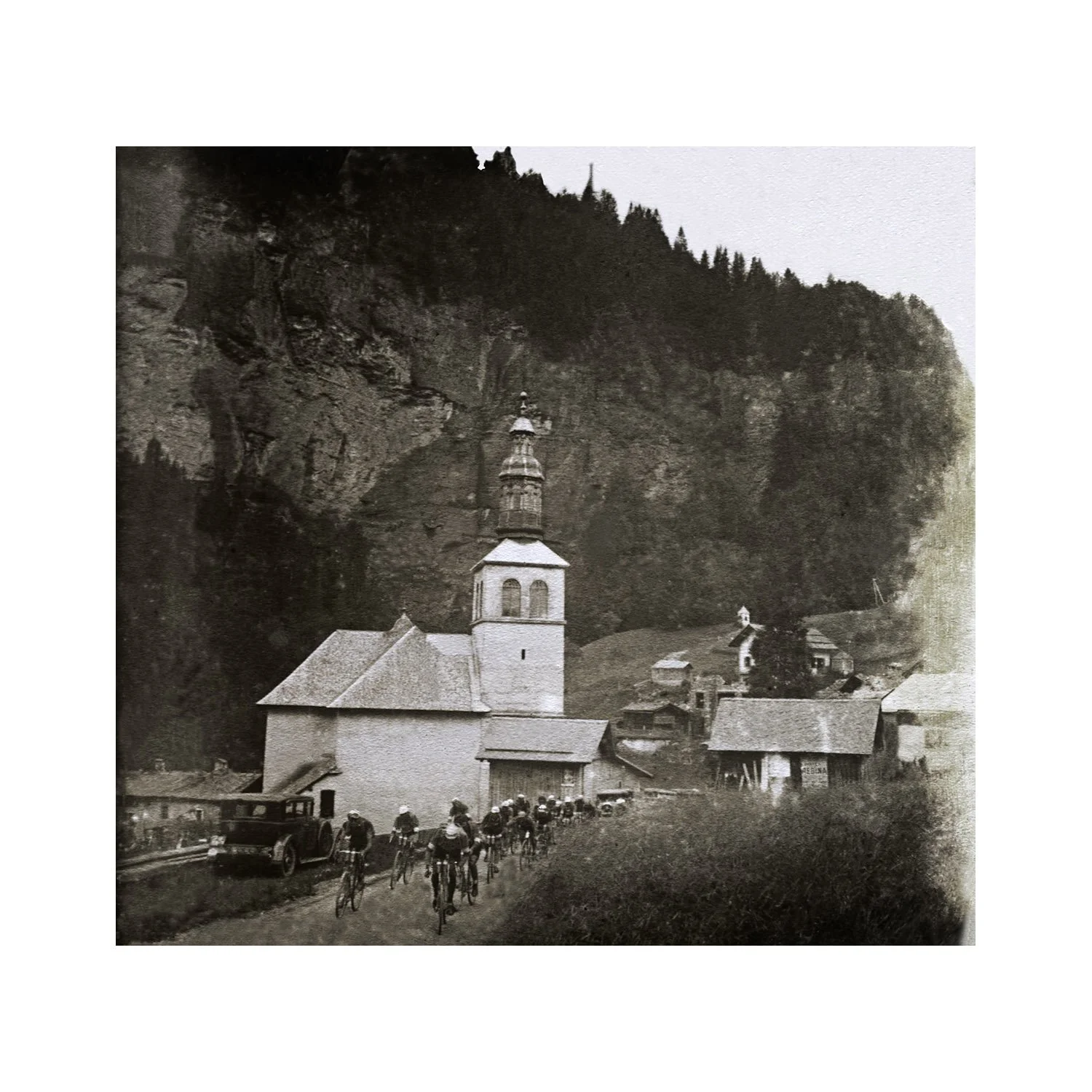 Peloton climbs through village