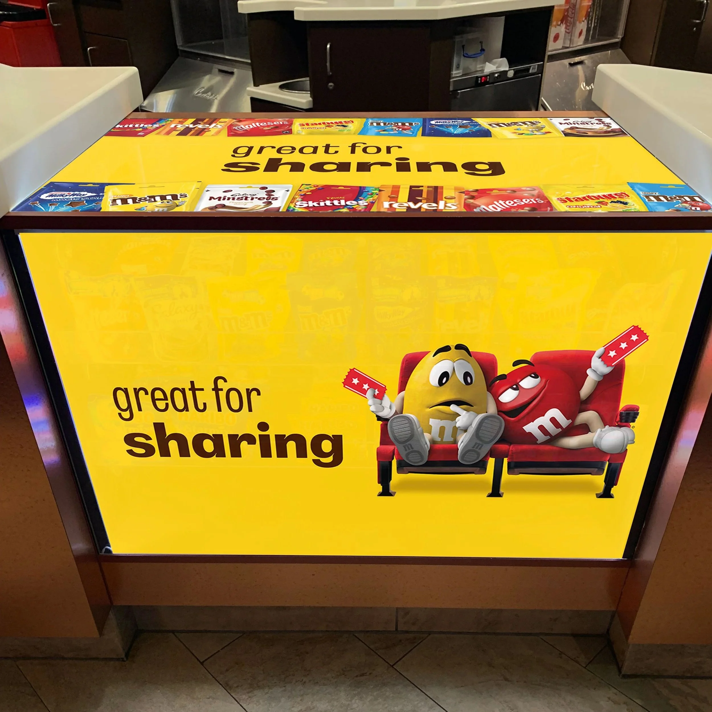 M&M's counter glass vinyl design & installation at Showcase Cinemas.