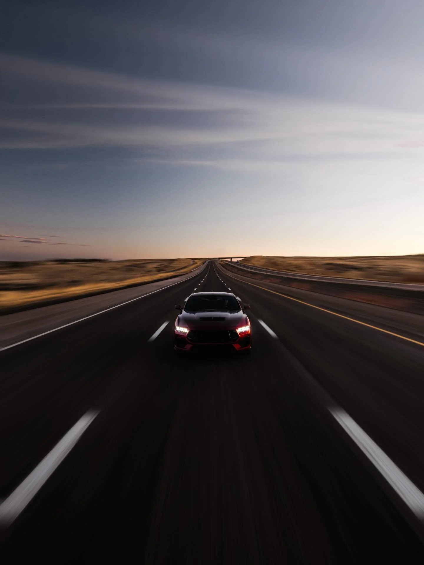 Purpose Built.

What starts as a familiar automotive language quickly shifts.

The car falls away&mdash;and the road becomes the subject.

From open highway stretches to the quiet, in-between moments of a road trip, the work reflects how the road is 