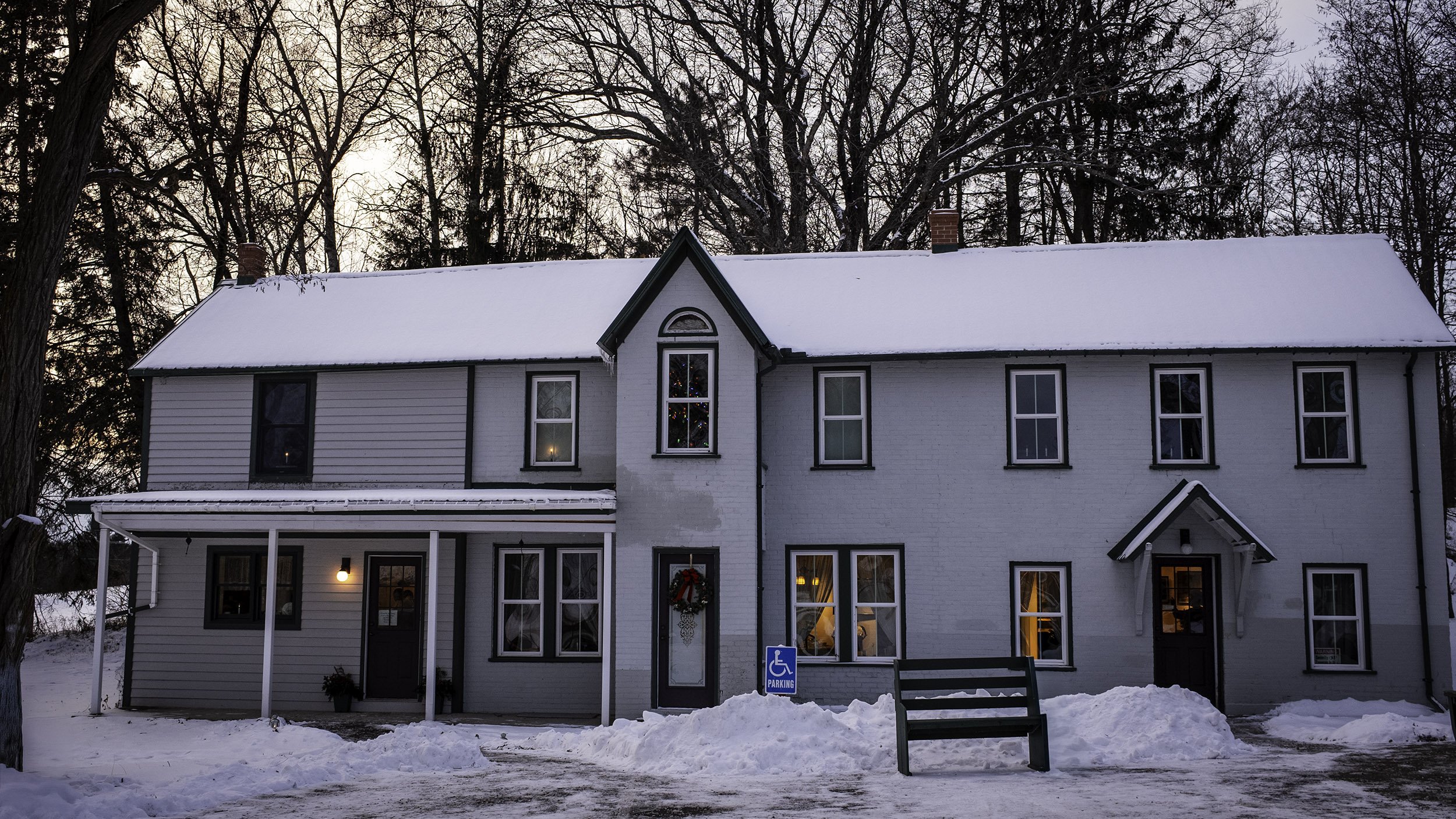 Jake Menghini Historical museum Odill Farmhouse exterior in the winter