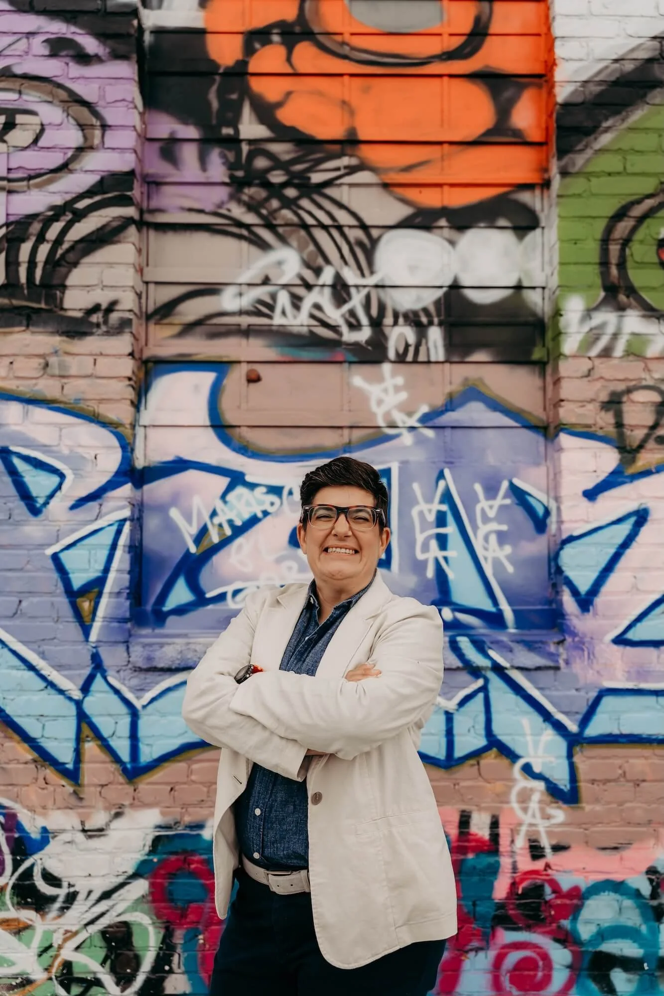 Francesca standing confidently beside a call-to-action that reads “Start Your Transformation.”