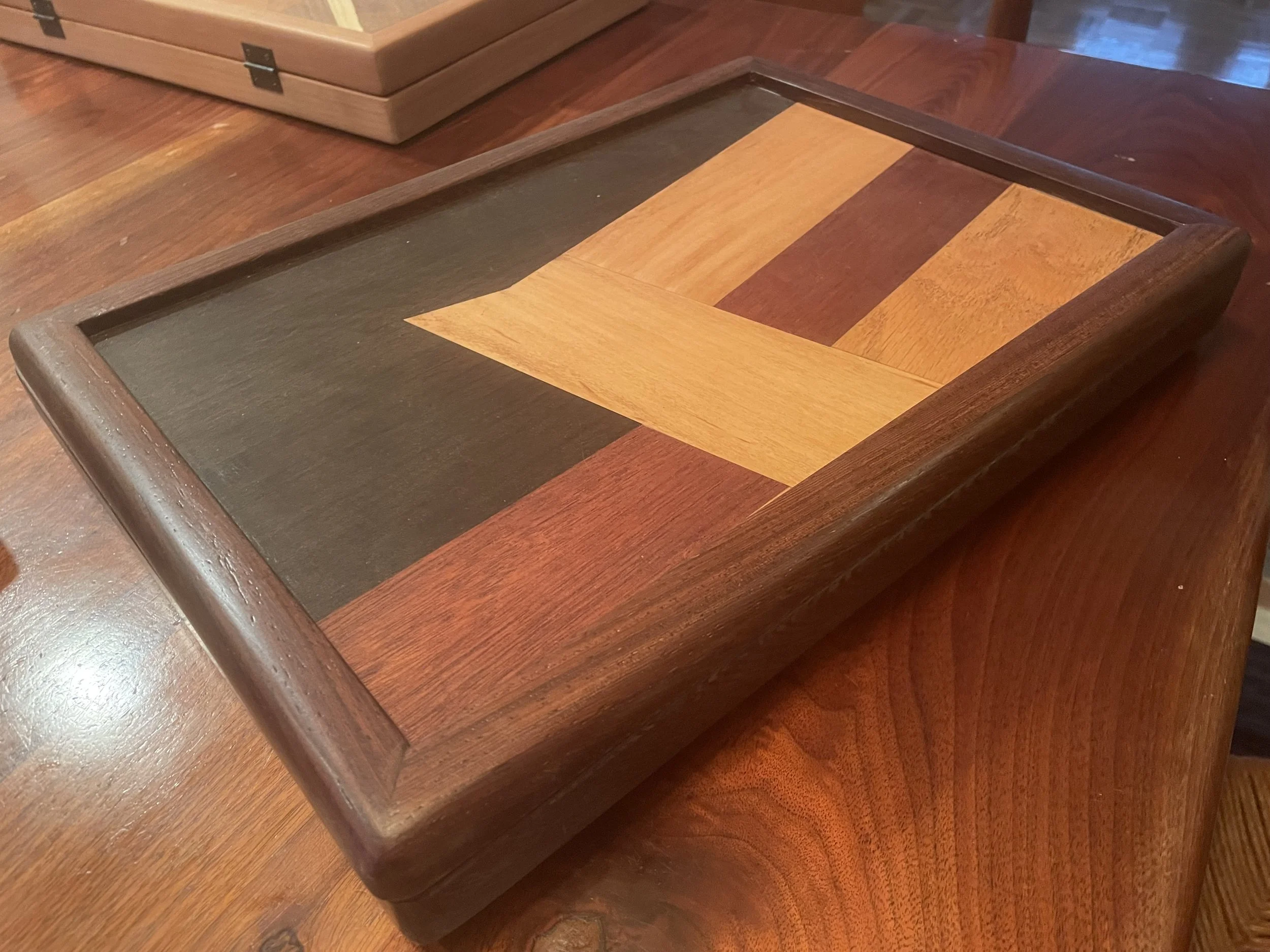 wooden serving tray with geometric inlay design