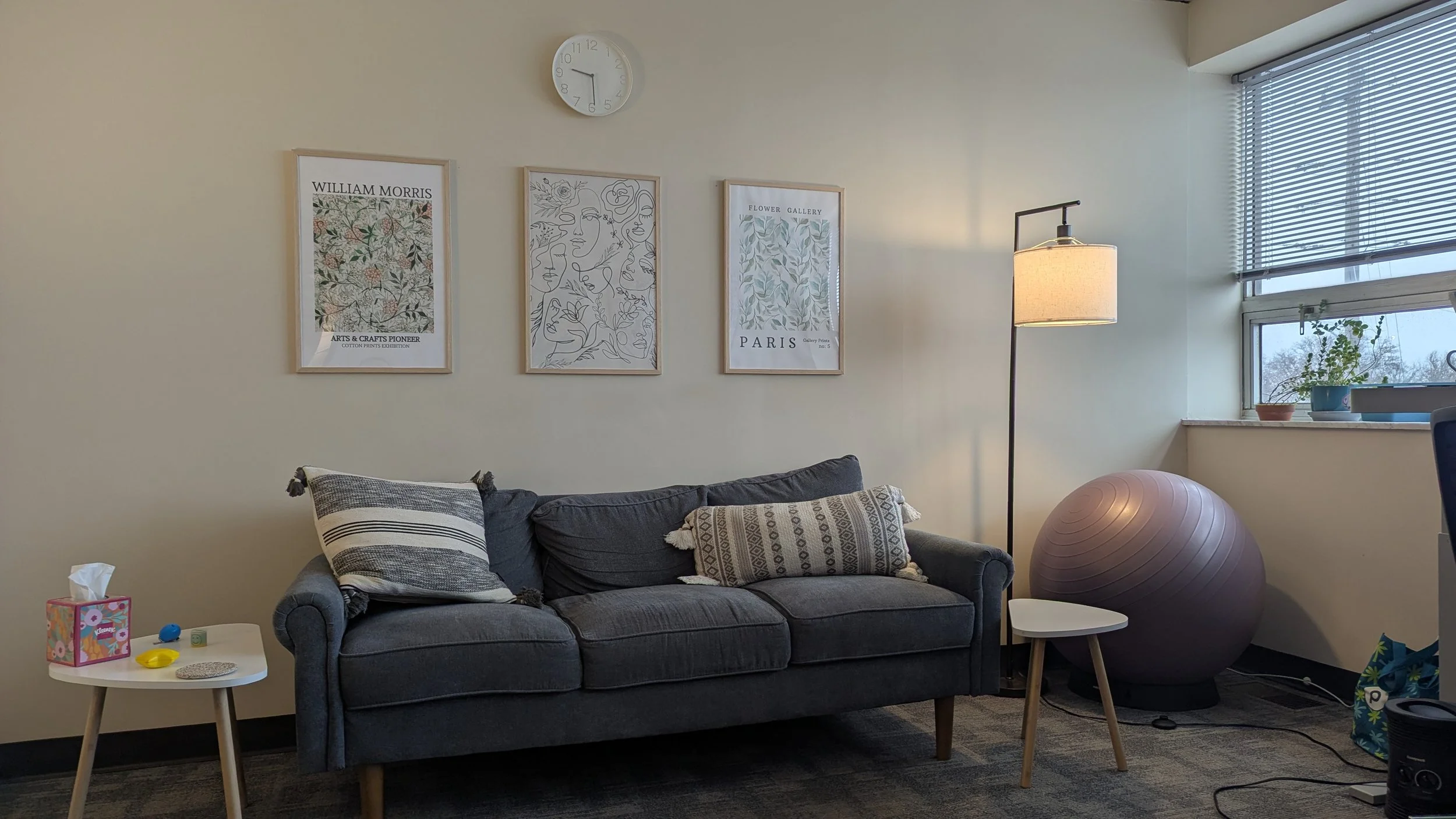 Second spacious and comfortable office space at River Rock Behavioral Health with windows and plants.