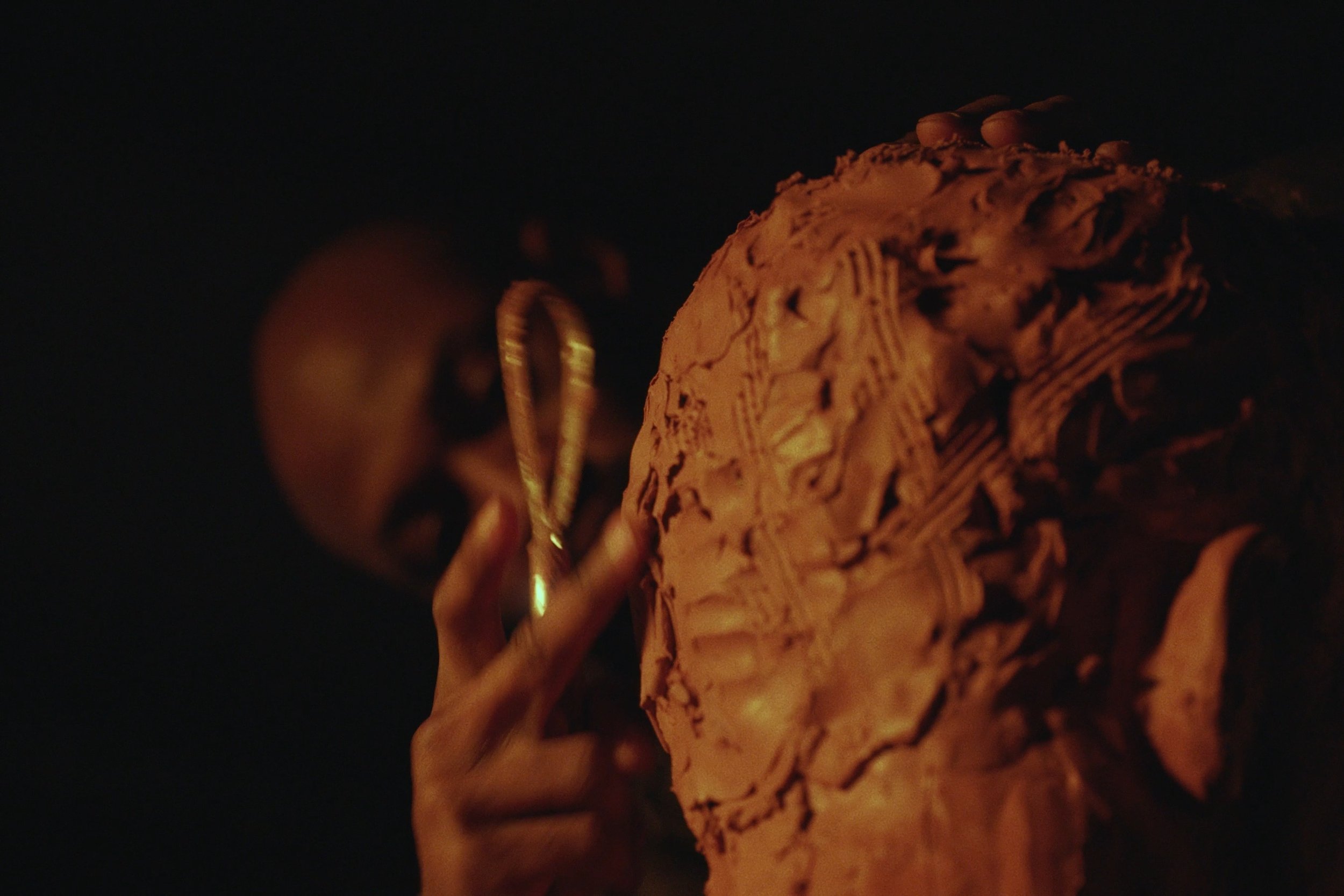 Image still from the short documentary film My Hands Purpose by Detroit based director John Sippel. Sculptor Austen Brantley sculpting process of making a tribute to Joe Louis breaking the color barrier in the PGA inside his studio. 