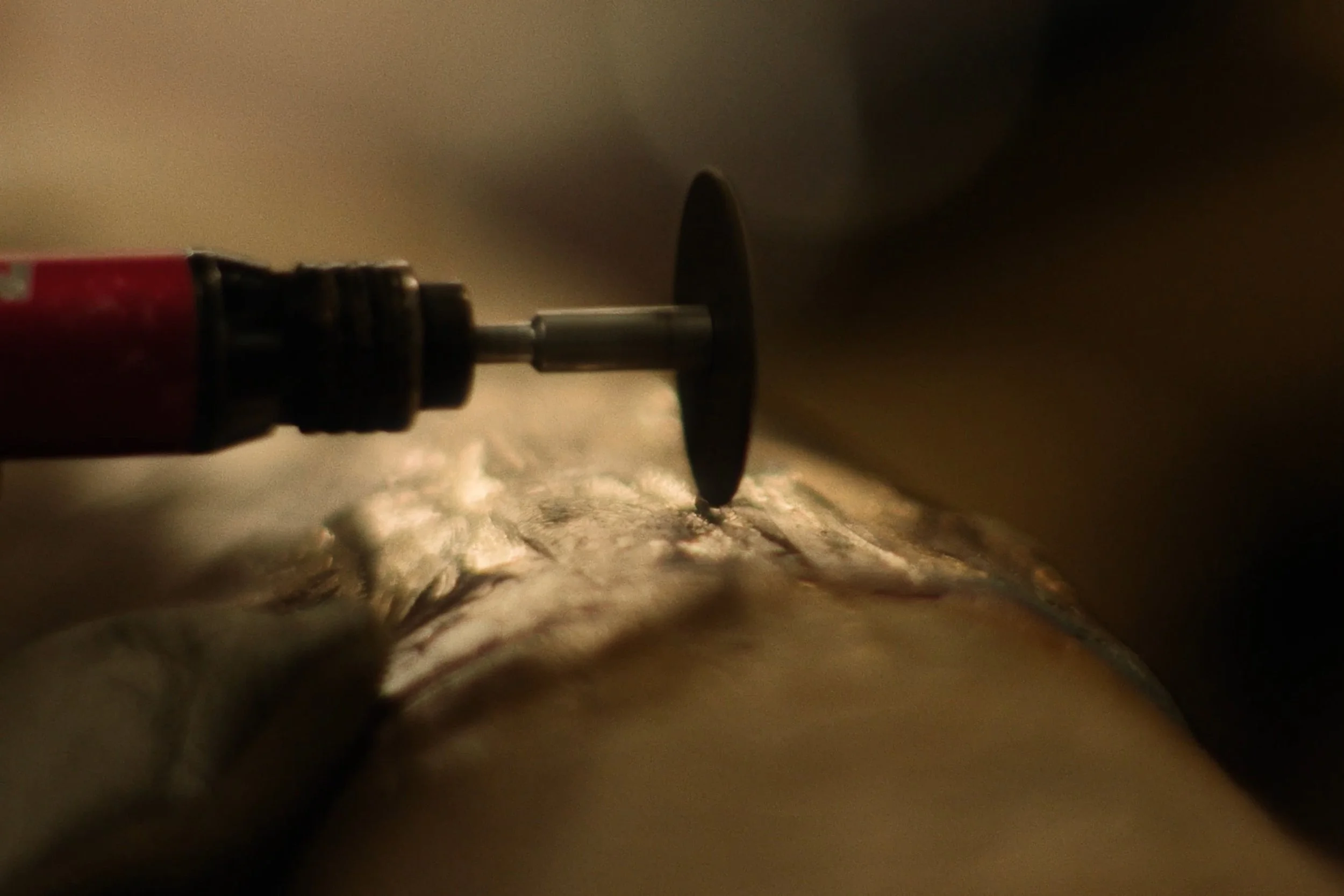 Image still from the short documentary film My Hands Purpose by Detroit based director John Sippel. Sculptor Austen Brantley bronzing sculpture process of making a tribute to Joe Louis breaking the color barrier in the PGA. Inside Michigan Art Castin