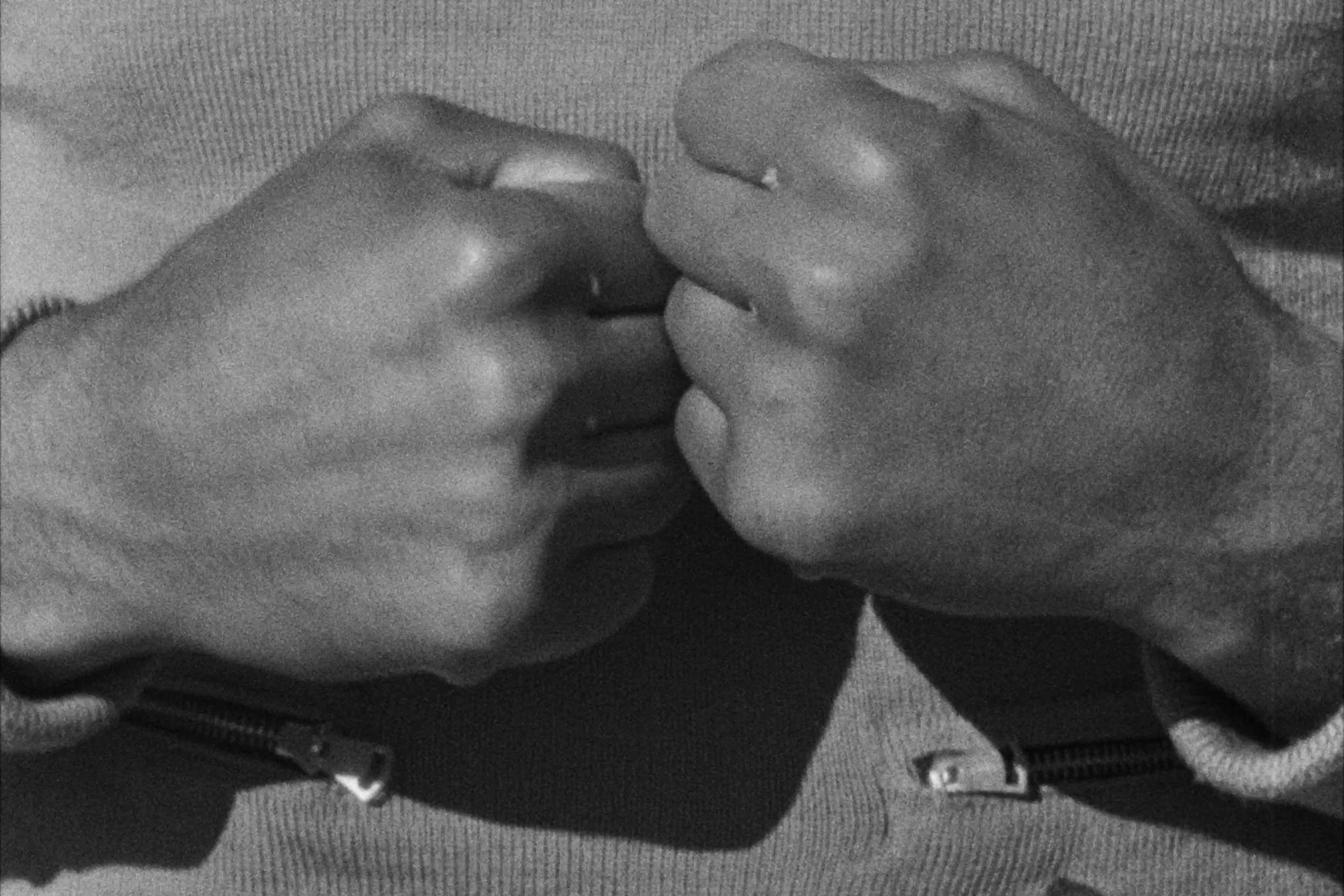 Image still from the short documentary film My Hands Purpose by Detroit based director John Sippel. Archival photo of Joe Louis Barrow fists. 