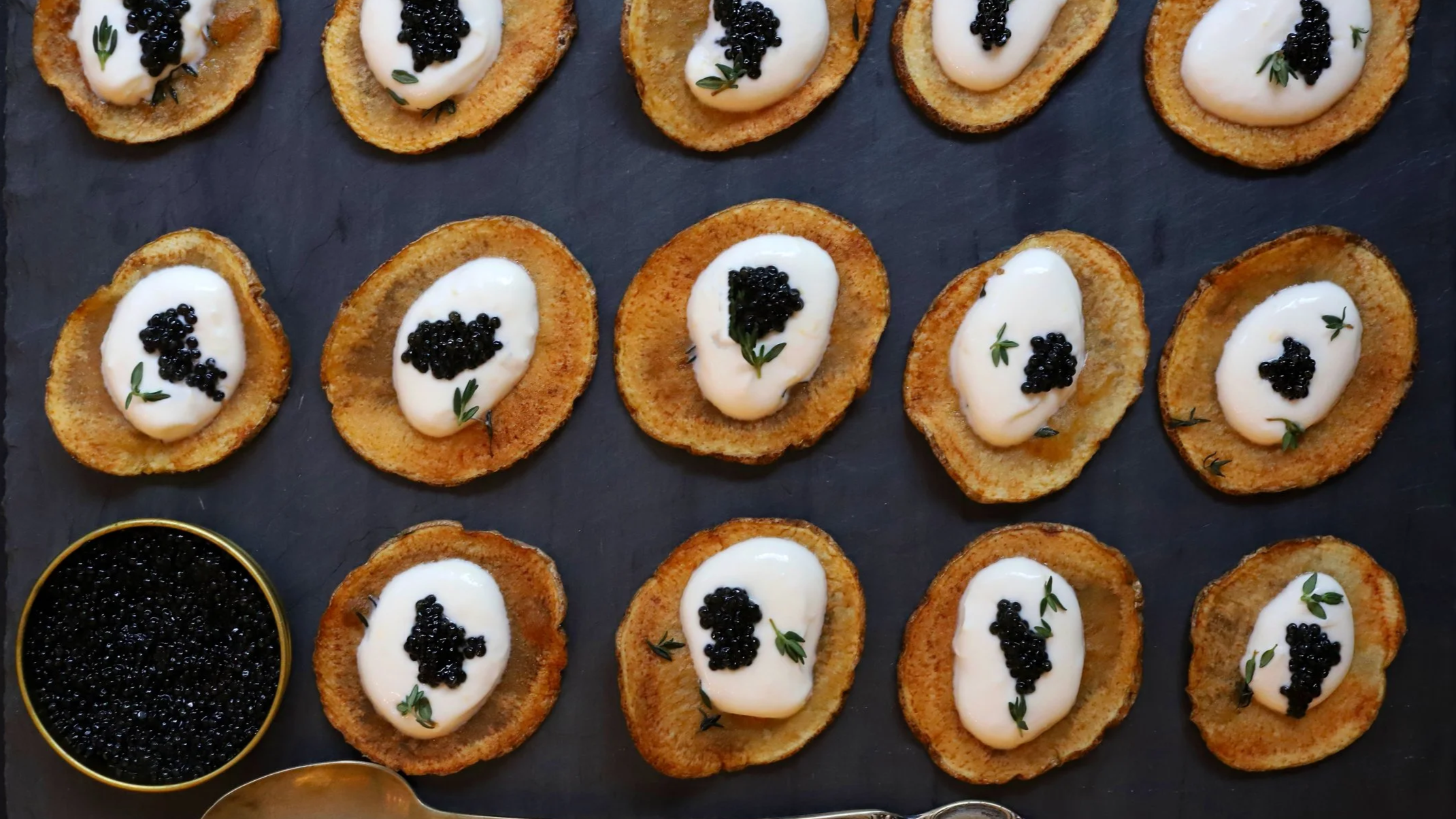 HOMEMADE POTATO CHIPS WITH CHAMPAGNE CRÈME FRAÎCHE AND CAVIAR