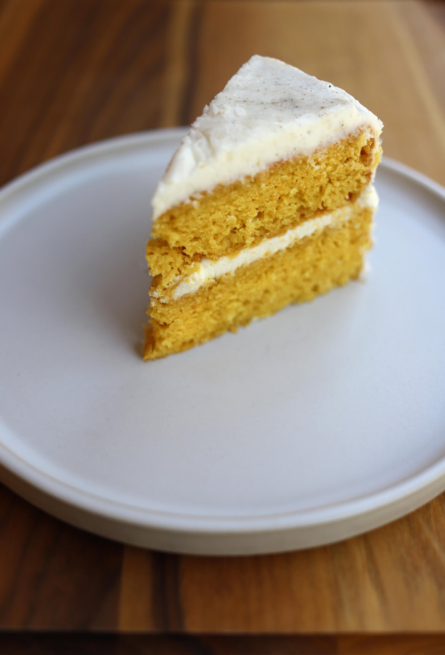 COCONUT MANGO CAKE WITH CARDAMOM CREAM CHEESE FROSTING