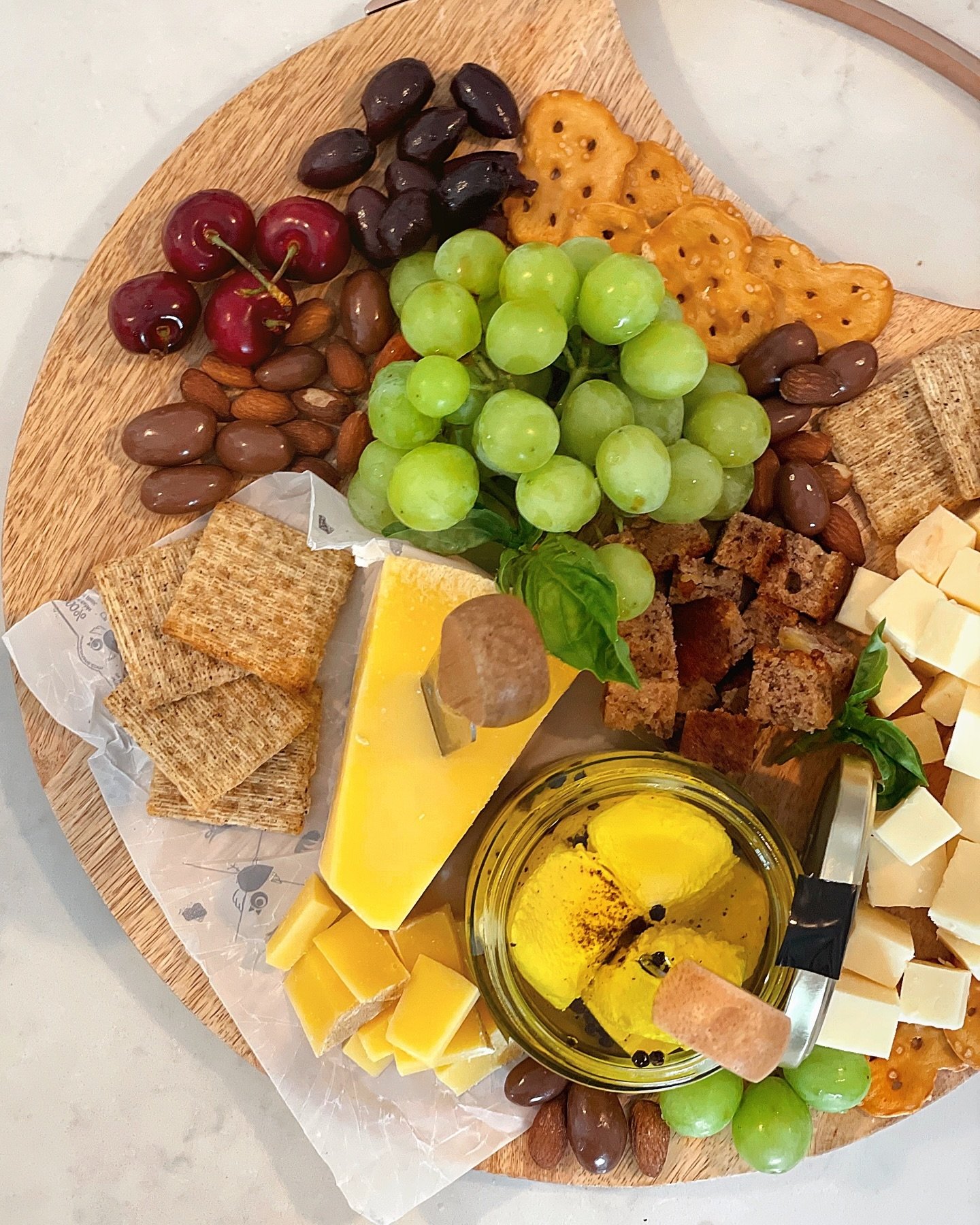 I know it's only 11 AM but thinking ahead, Thursday night wine and cheese sounds so perfect right now. 

One of my favorite cheeseboard experiences is building one at a friend's house. I raid their fridges and pantries and come up with something diff