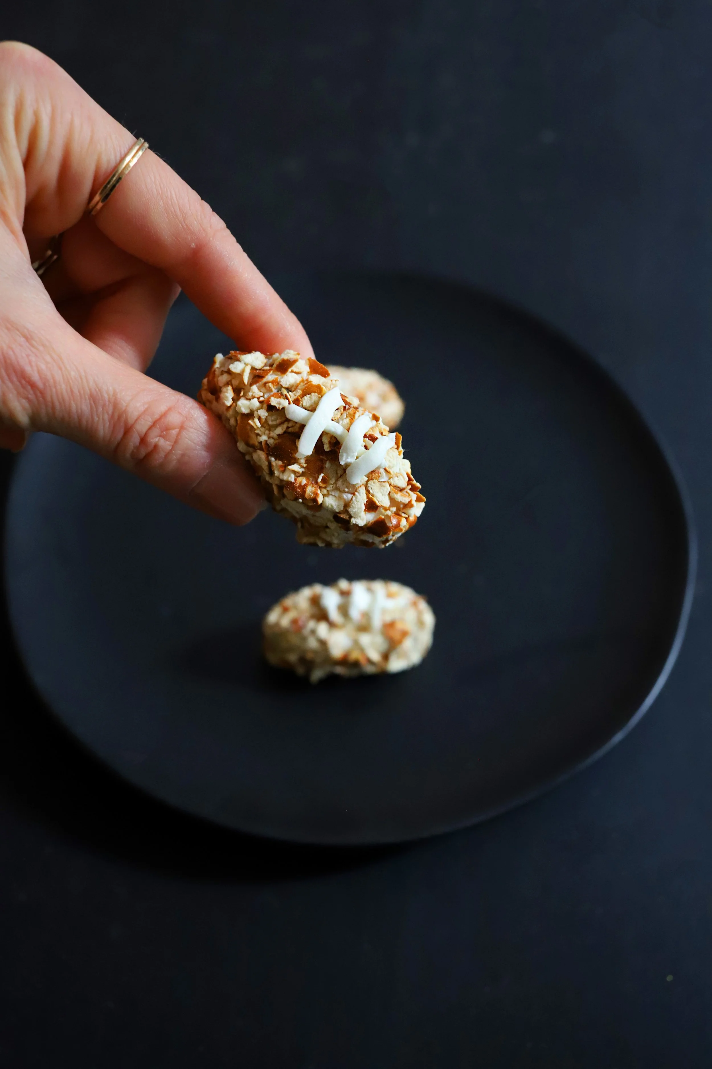 FOOTBALL SHAPED PRETZEL-CRUSTED HONEY TRUFFLE GOAT CHEESE BITES