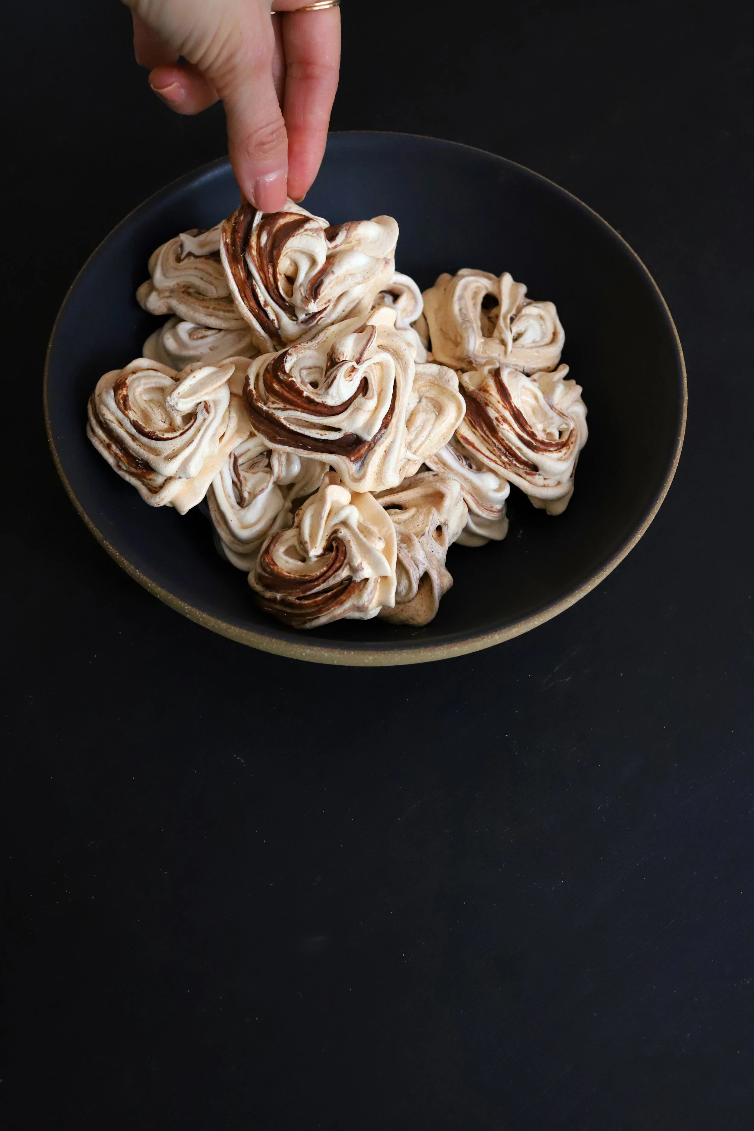 HEART-SHAPED FRENCH MERINGUE COOKIES WITH VANILLA, CARDAMOM, &amp; CHOCOLATE SWIRL