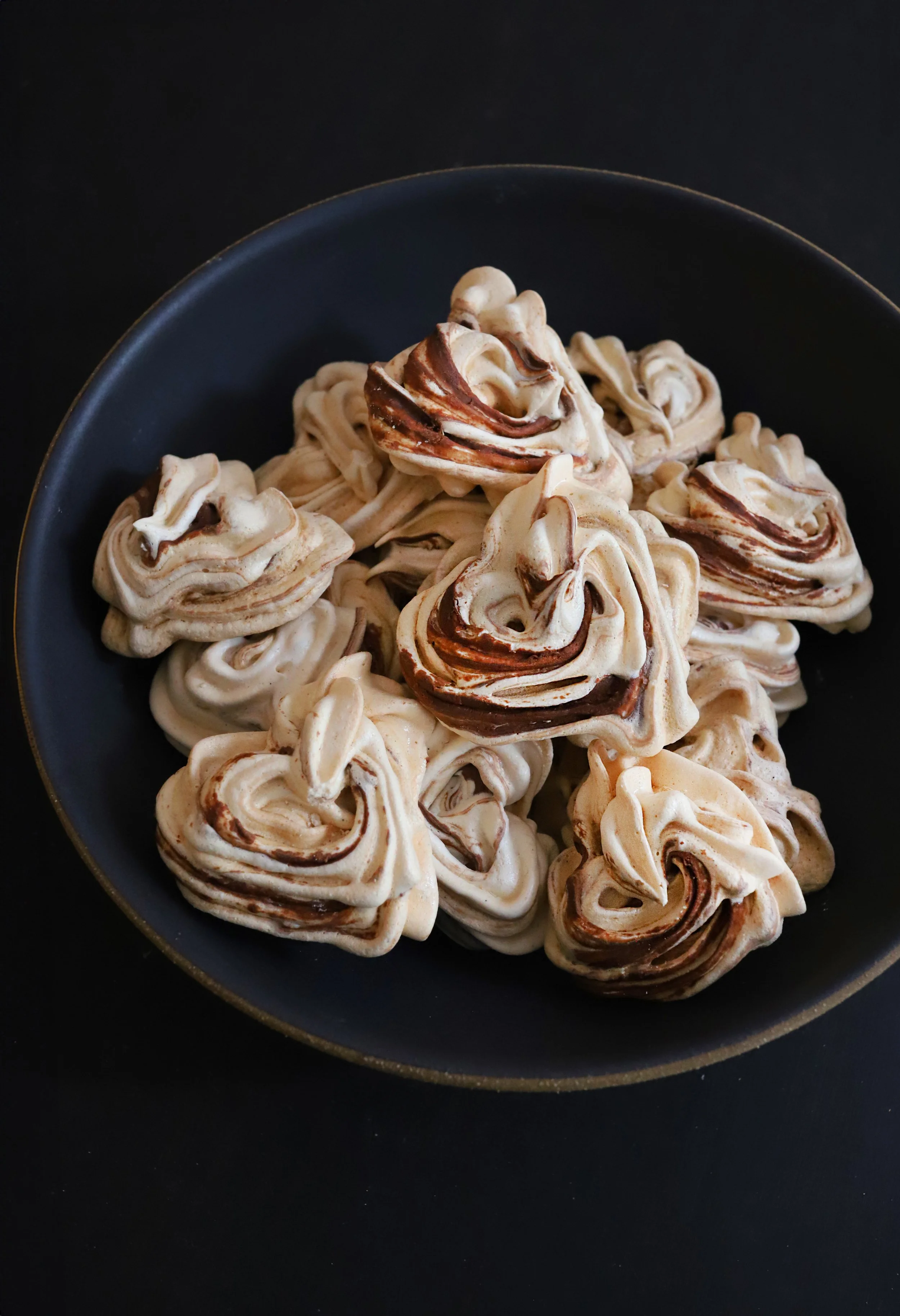 HEART-SHAPED FRENCH MERINGUE COOKIES WITH VANILLA, CARDAMOM, &amp; CHOCOLATE SWIRL