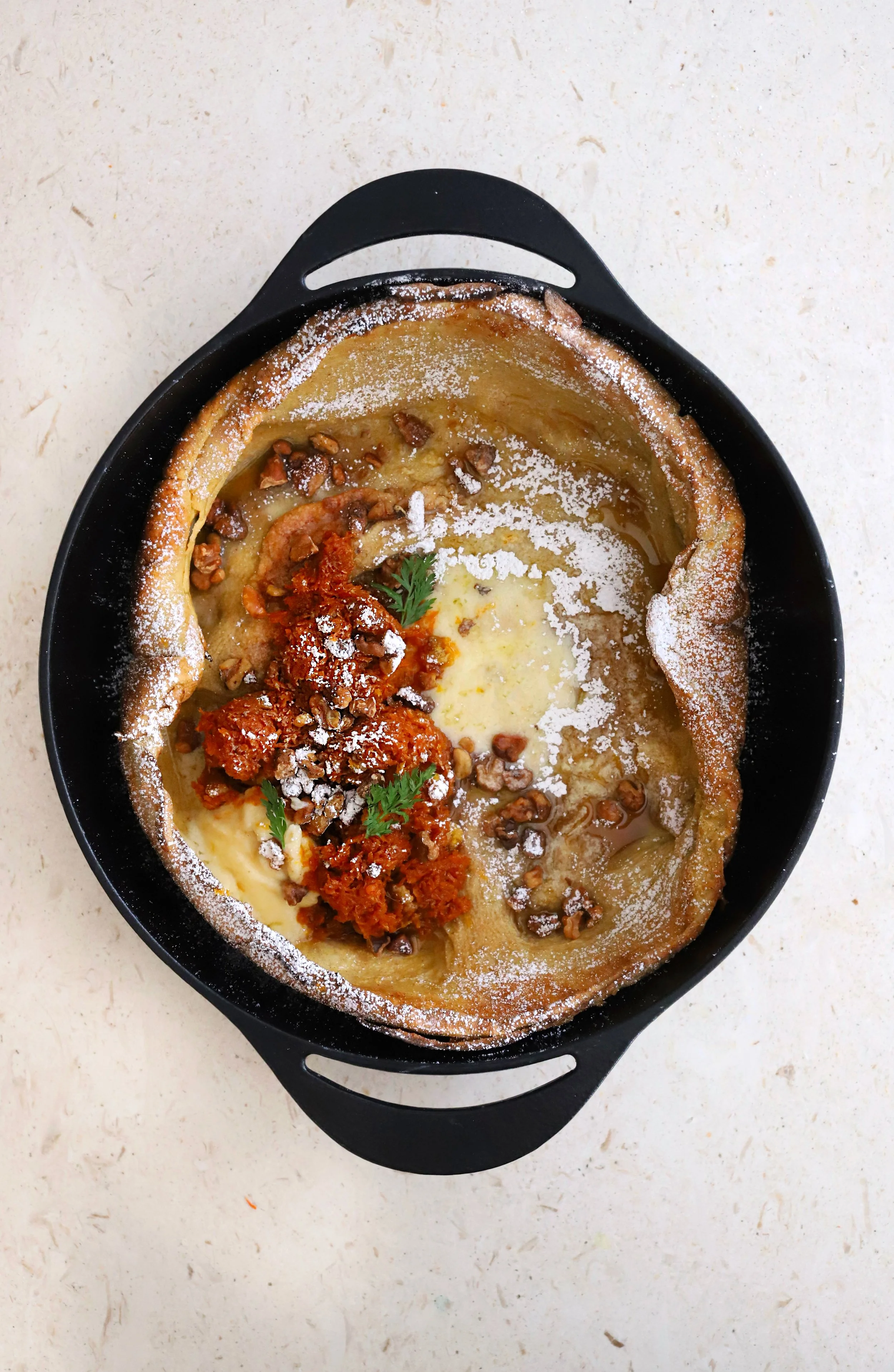 VANILLA DUTCH BABY WITH CARROT CAKE SPICED COMPOTE