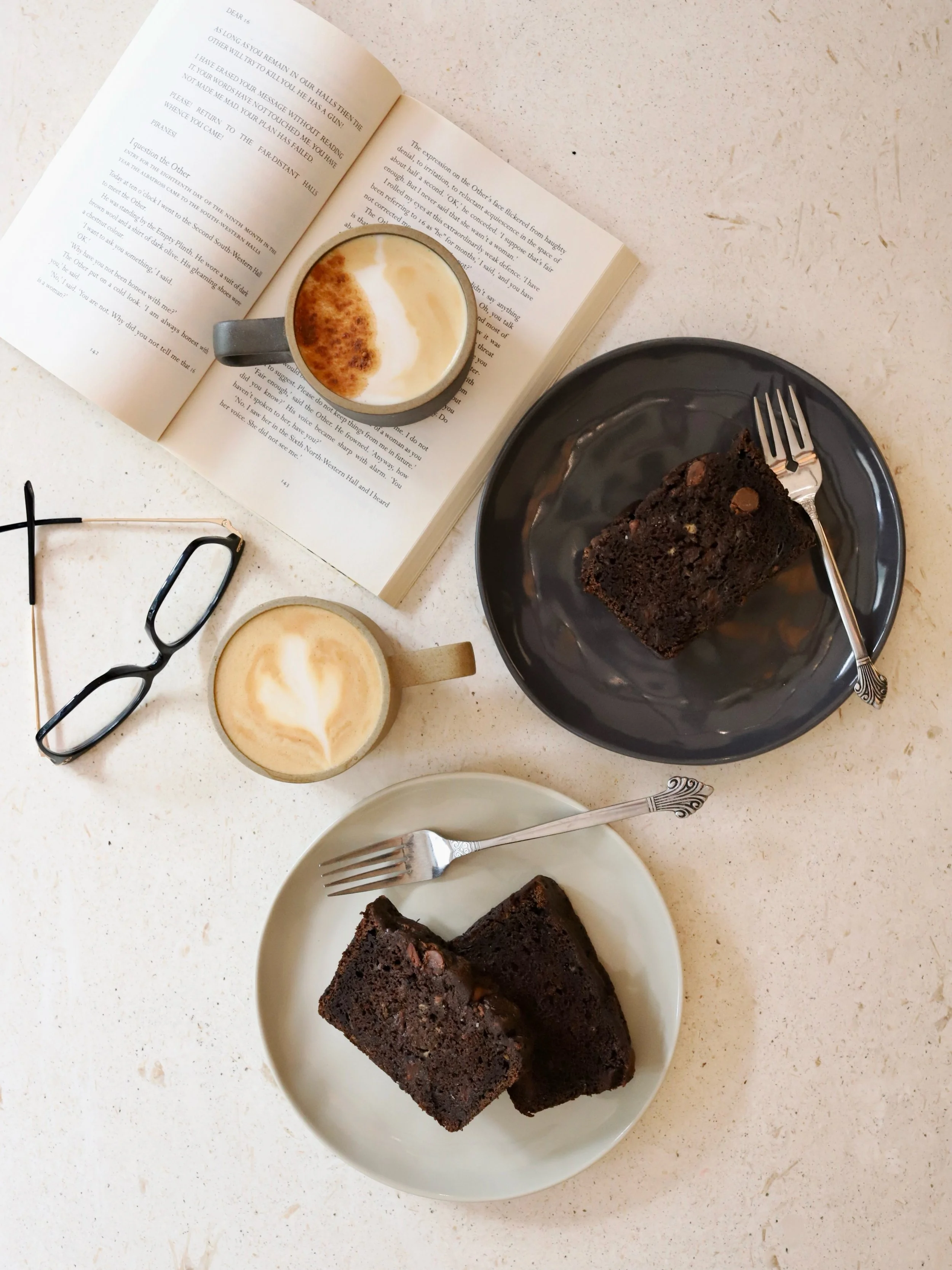 Home caf&eacute; vibes (trying to ignore the sounds of Pok&eacute;mon in the background)

All about this Chocolate Chocolate Chip Banana Bread my boys made paired with an almond latte. 🤩

#CoffeeAndChampagneKitchen #BananaBread #ChocolateBananaBread