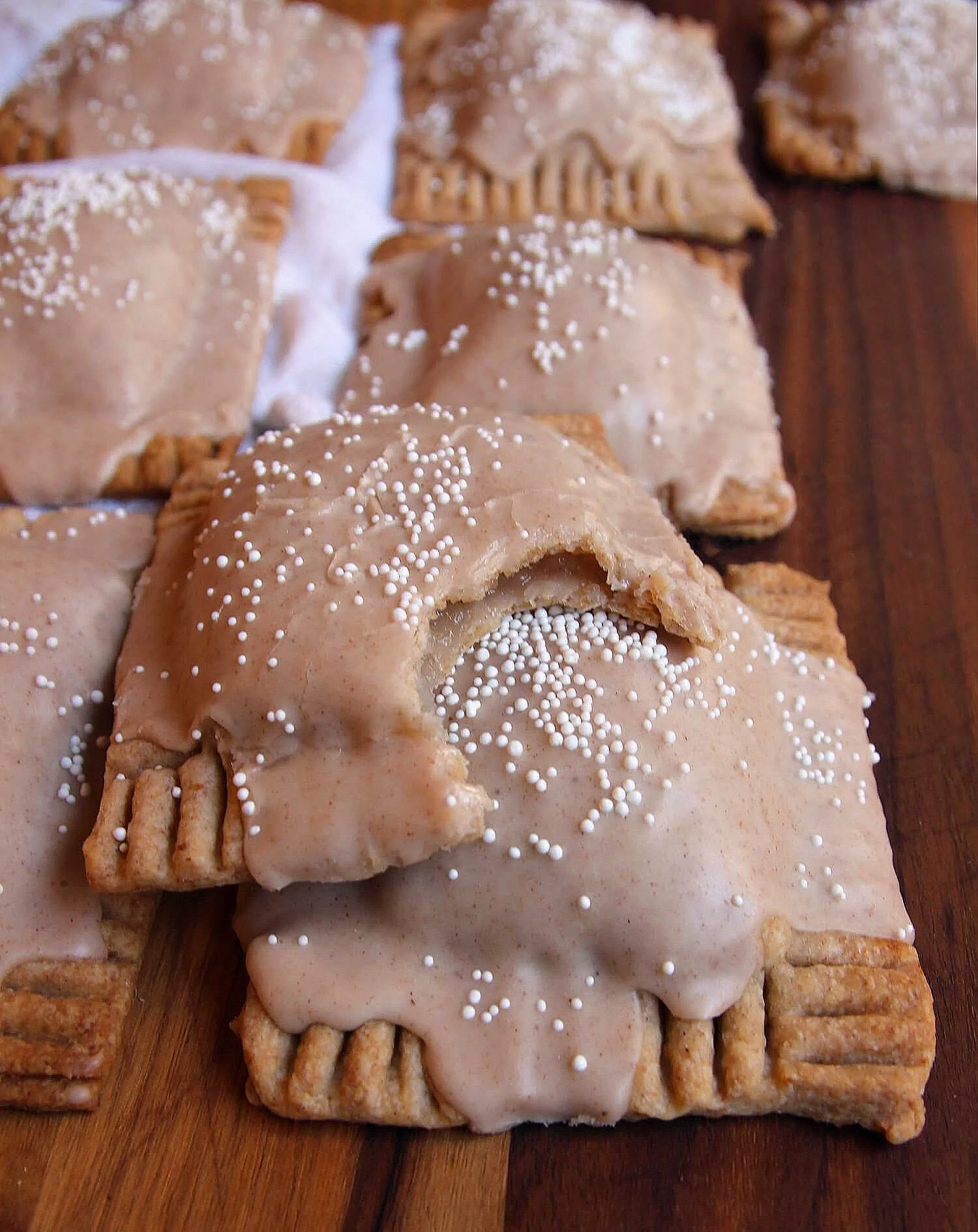 Apple-picking season calls for homemade apple Pop-Tarts. 🍎✨ Flaky cinnamon pastry, warm apple filling, and a generous layer of cinnamon glaze.

The only question: corner, edge, or center piece first?

Get this full Apple Pop-Tarts recipe on the @cof