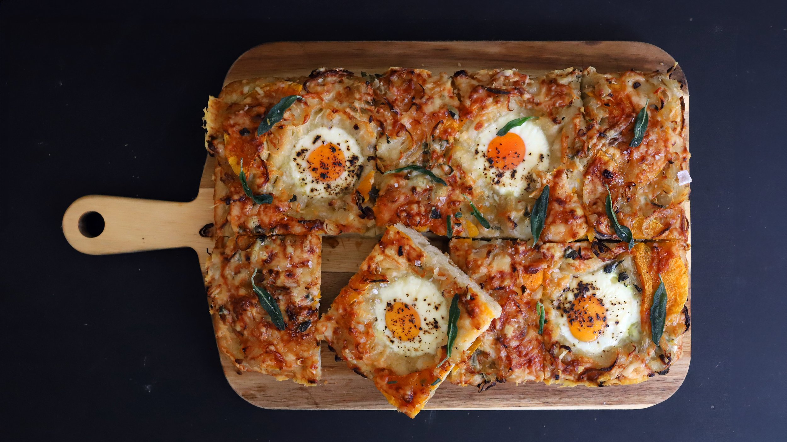 FALL BREAKFAST FOCACCIA WITH BUTTERNUT SQUASH, CARAMELIZED SHALLOTS, GRUYÈRE &amp; BAKED EGGS