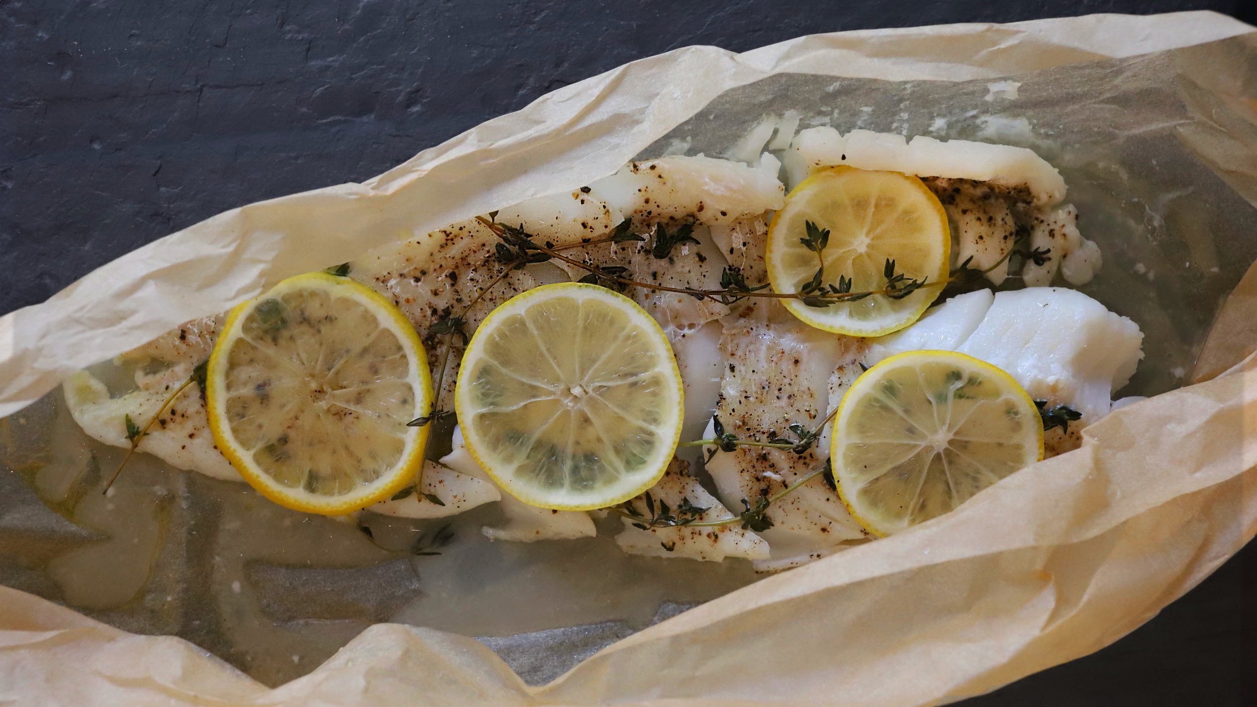 SIMPLE COD EN PAPILLOTE WITH LEMON, THYME, &amp; OLIVE OIL
