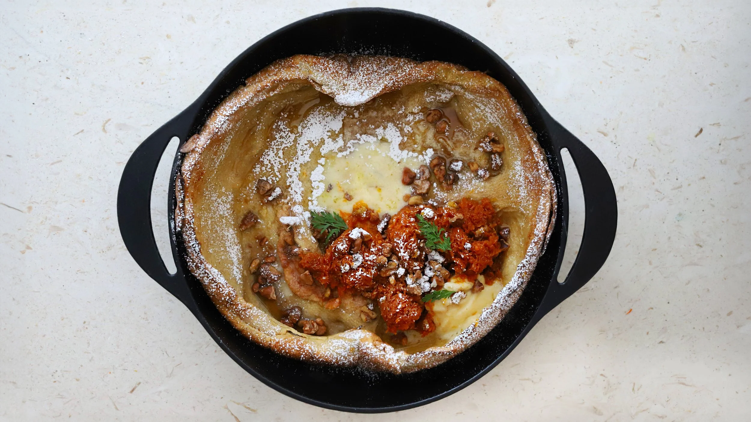 VANILLA DUTCH BABY WITH CARROT CAKE SPICED COMPOTE