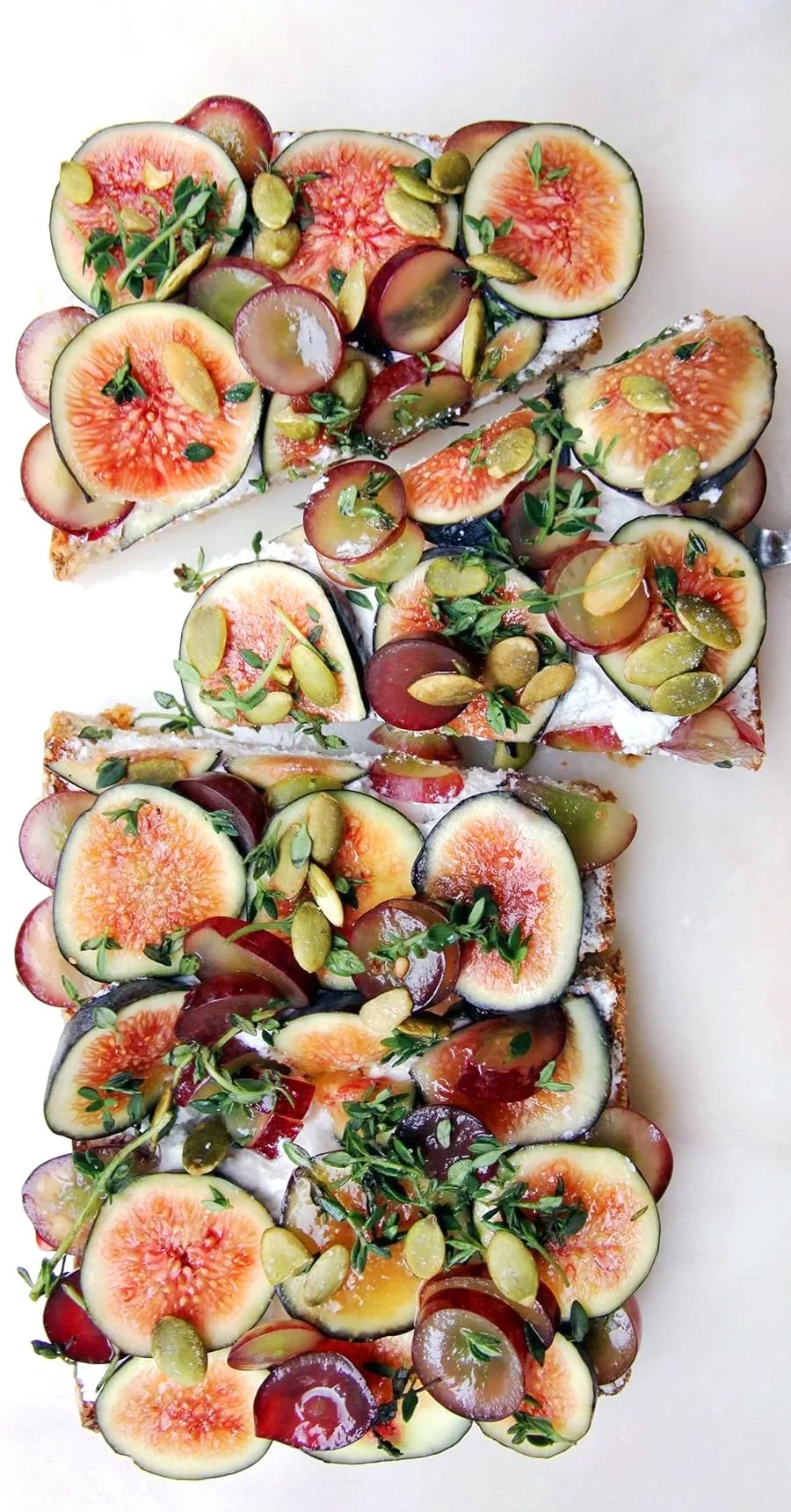 Fig and Ricotta Toast with grapes and herbs