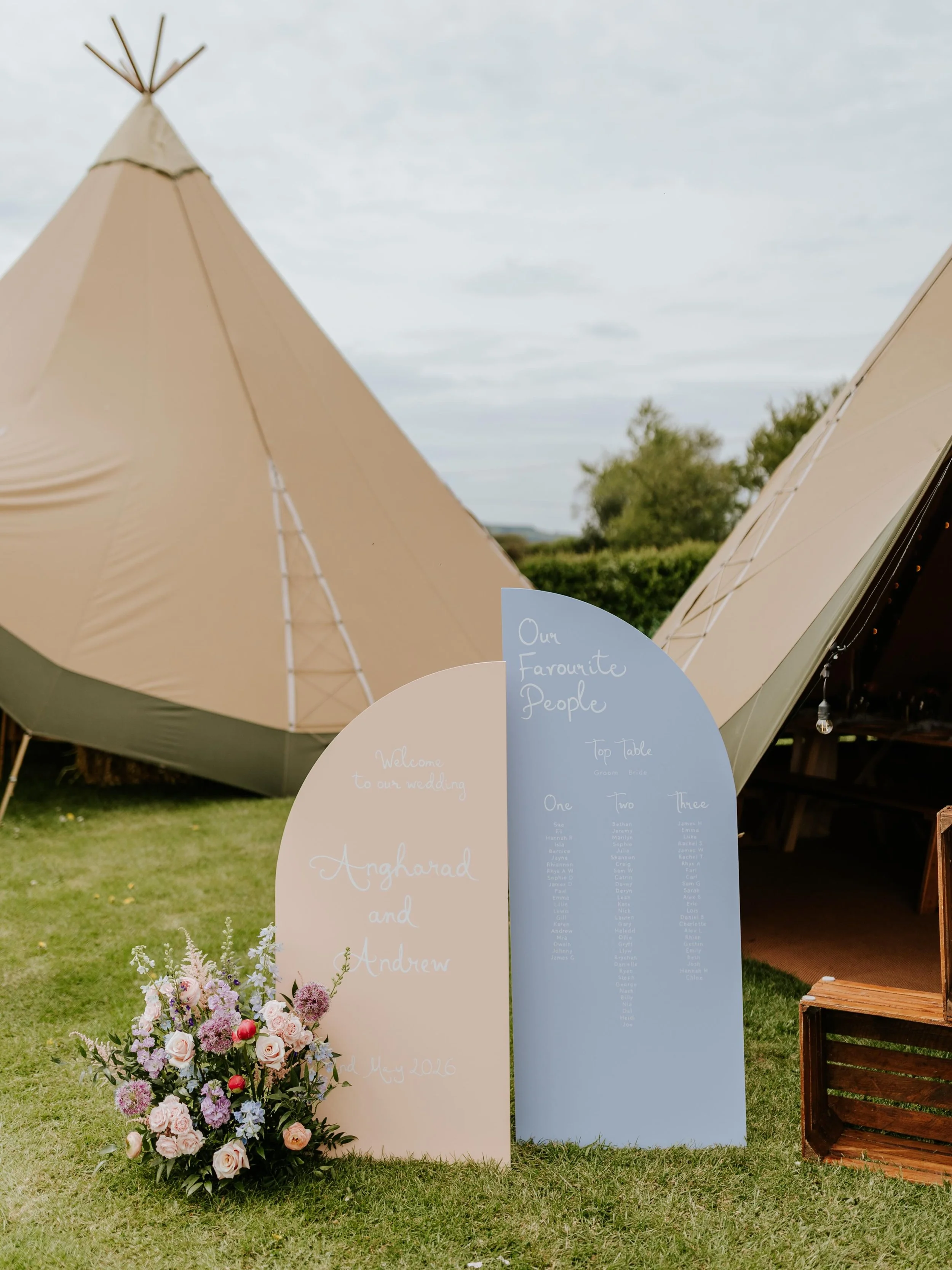 Handpainted custom signs for Haz &amp; Andrew✨ 

In a dreamy colour combo of peach and blue with a whimsical font. Setting the tone for their wedding breakfast inside the tipi🌸🌿

Photographer @sophiecollinsphotography_ 
Venue @cefncantref_campsite_