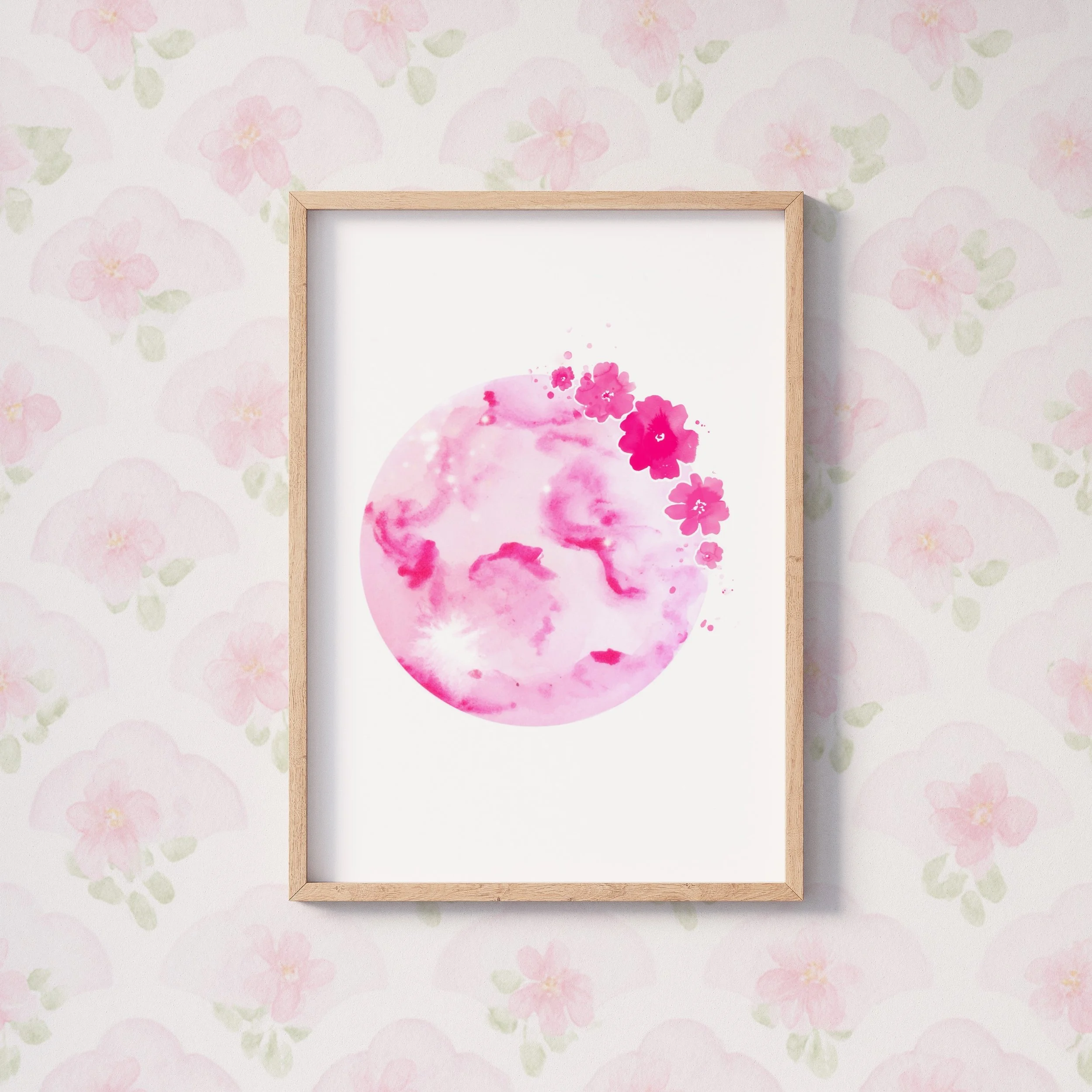 A watercolor pink moon surrounded by delicate floral details, inspired by celestial themes and botanical forms