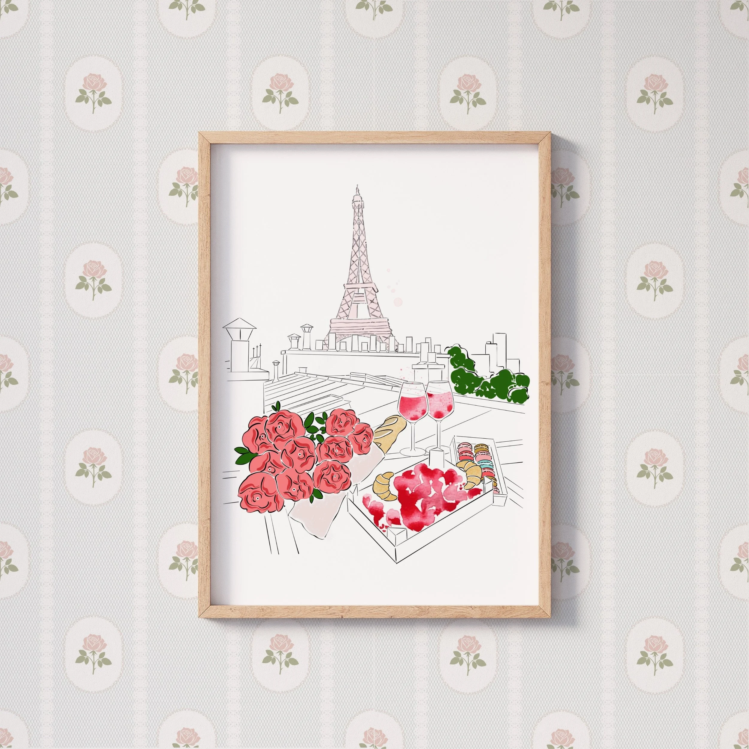 A rooftop view of the Eiffel Tower featuring coral roses, French macarons and Parisian details. Mixed media illustration. 