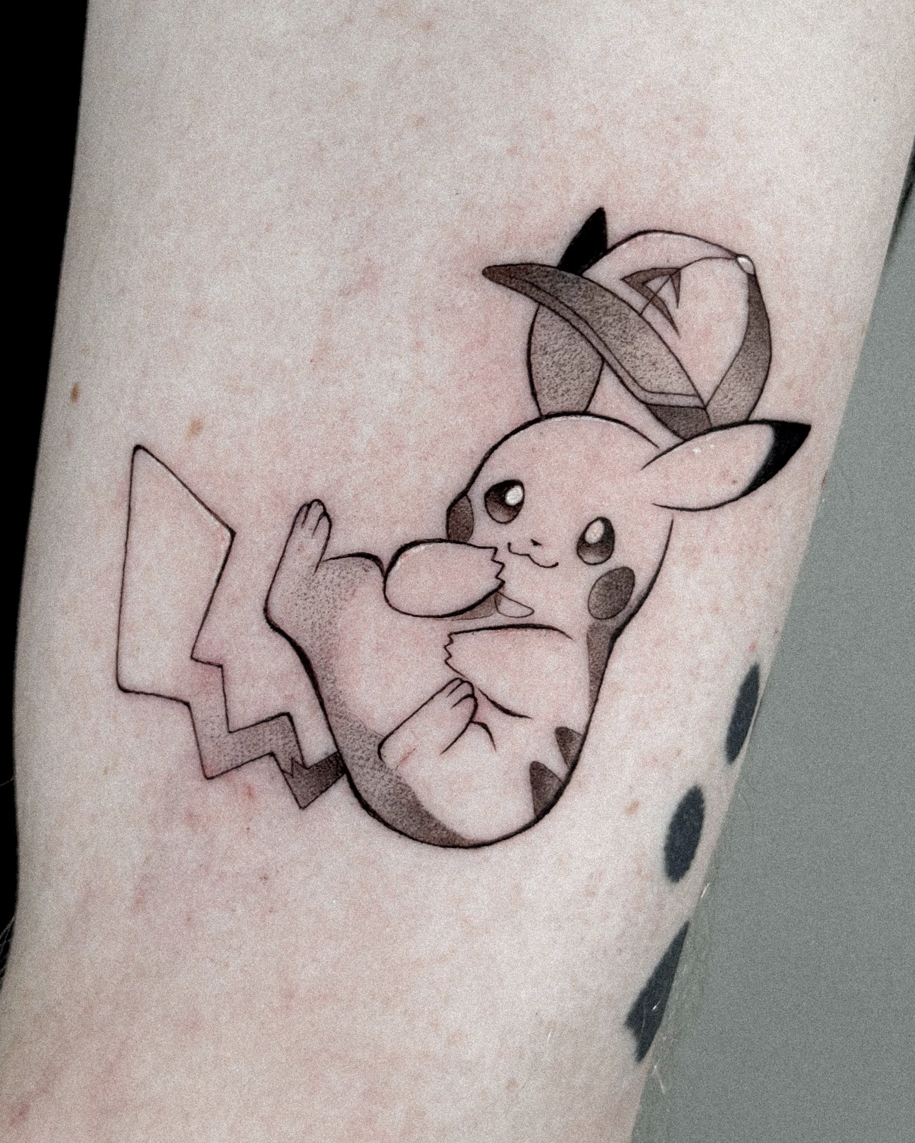 pikachu ash caps.jpg