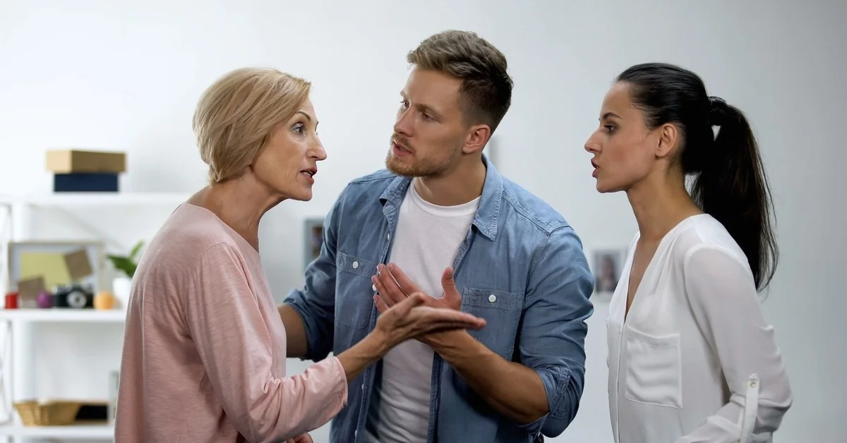 A woman argues with her siblings in a home, as they gesture and speak during a tense family disagreement.