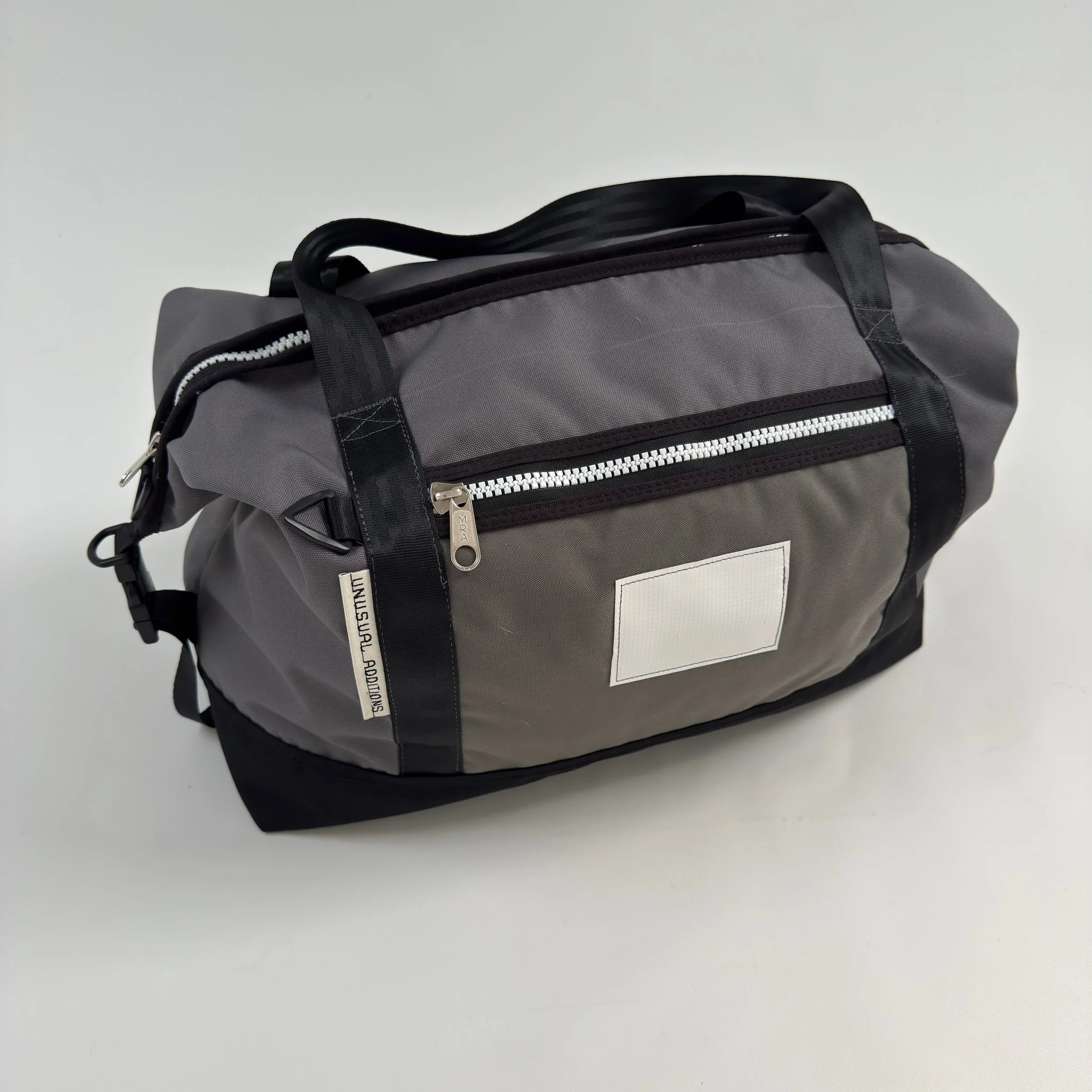 TBM0059 Travel bag medium/Carry On         Grey/Black/Lining Grey