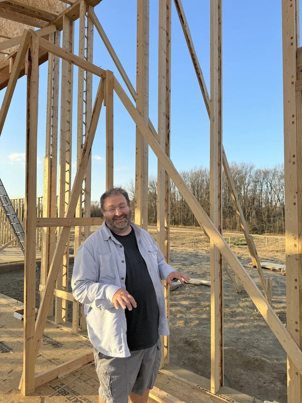  Josh is standing in his office “working” 