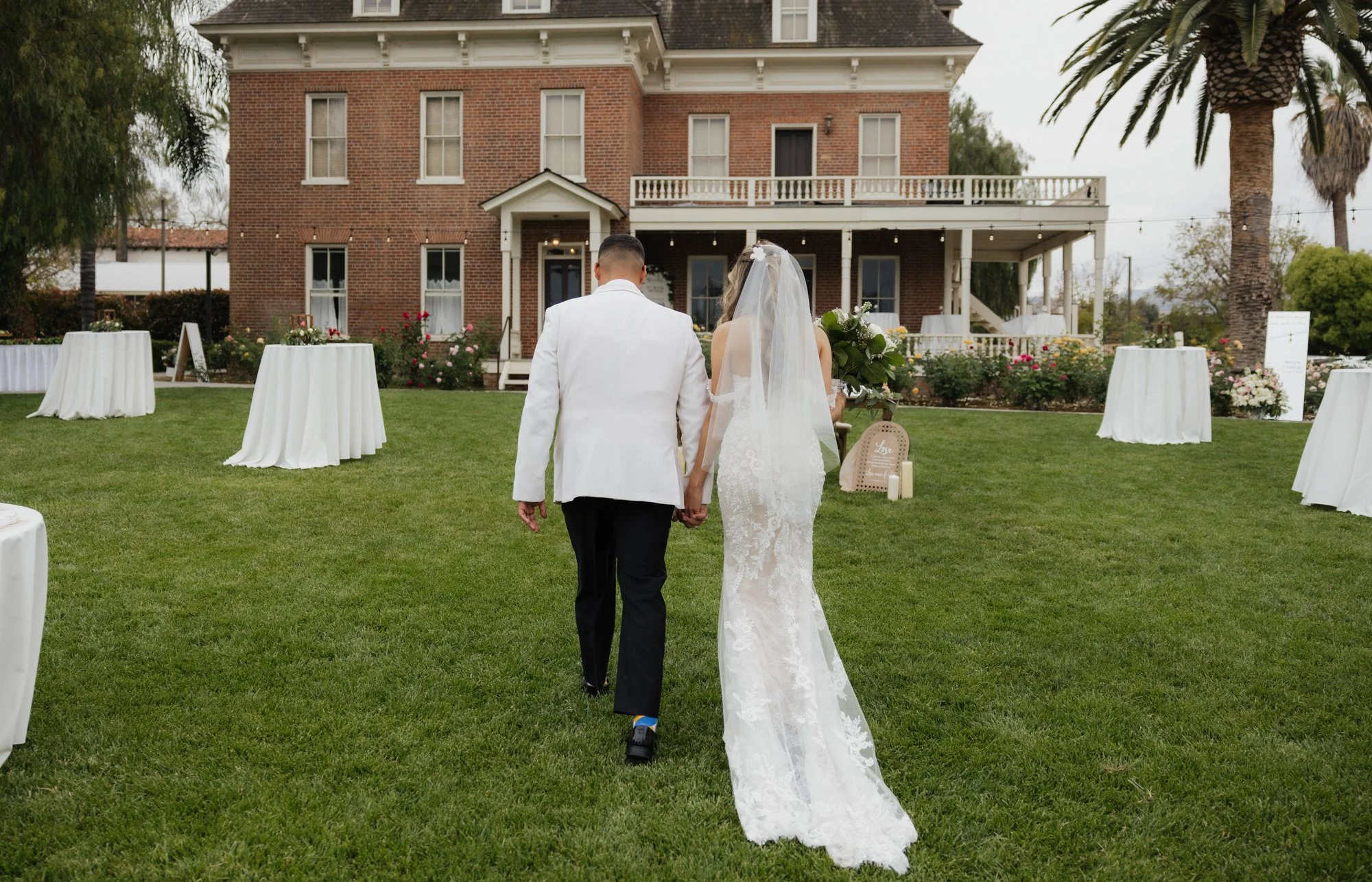 Candid moment of bride and groom after ceremony at the Barton House In Redlands Southern California