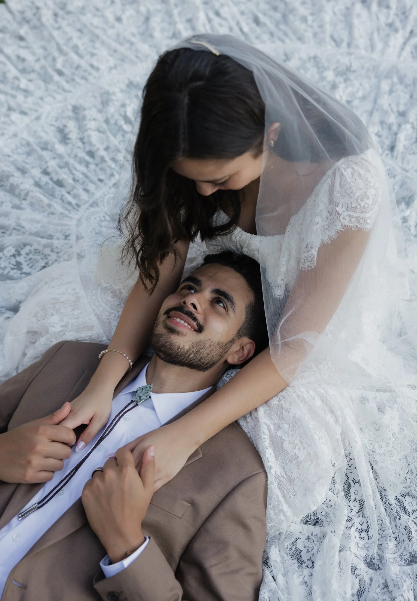 Editorial photographer takes candid photo of bride and groom during their wedding in Southern California.