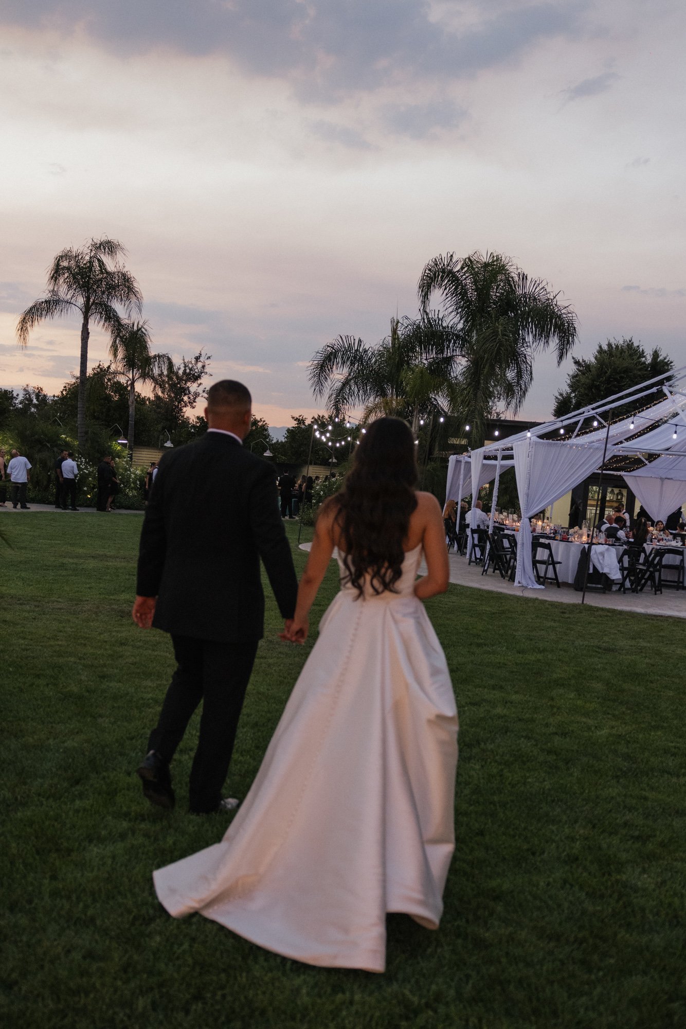 Candid photographer takes a candid photo of bride during her wedding in Los Angeles California.