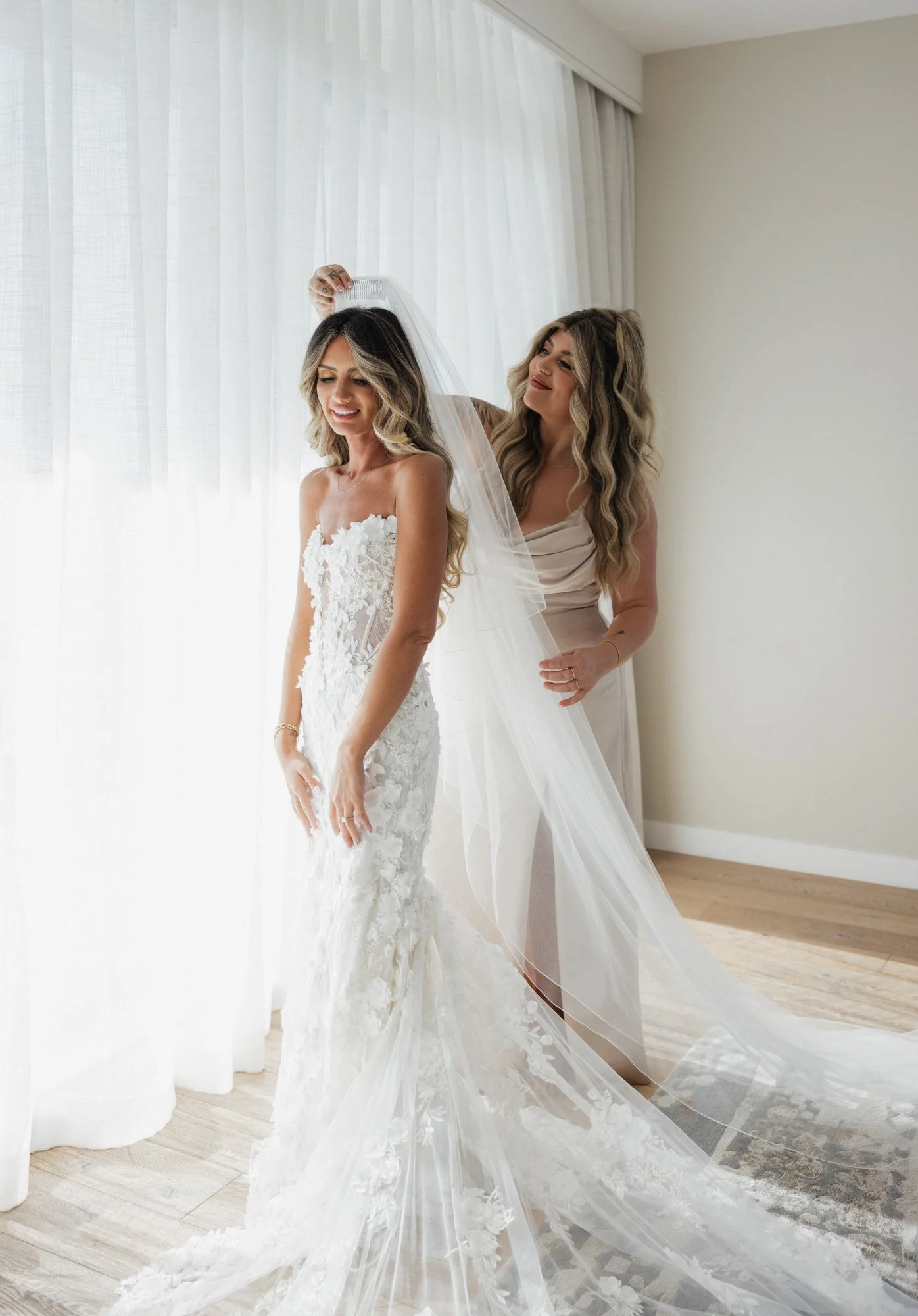Candid photographer takes a candid photo of bride during her wedding in Los Angeles California.