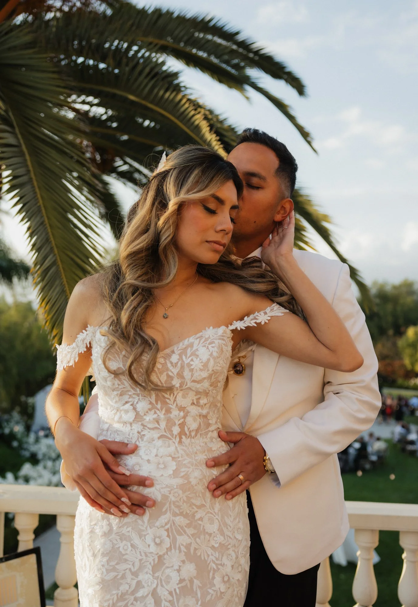 Candid photographer takes a candid photo of bride and groom during their wedding in Los Angeles California.