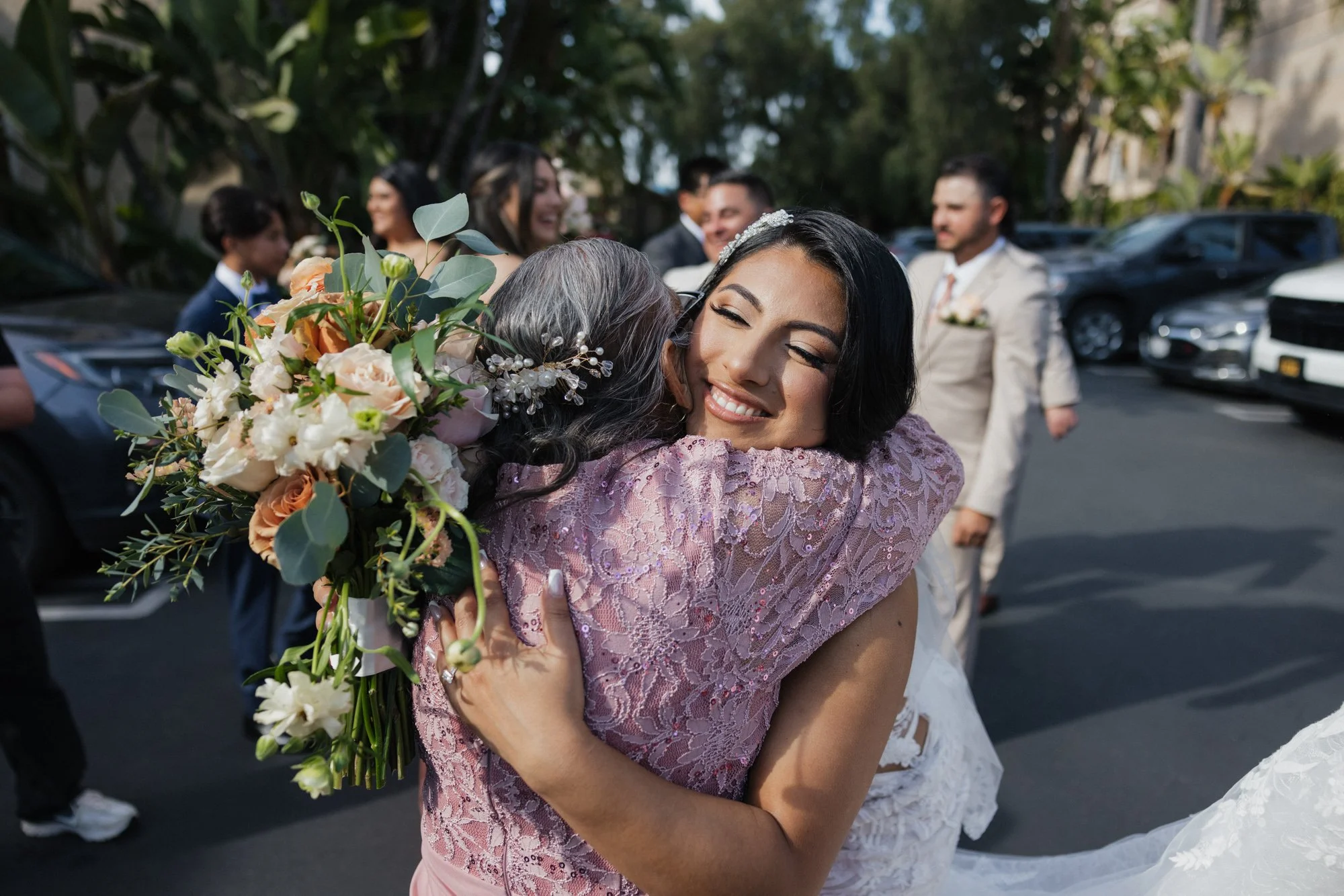 Candid photographer takes a candid photo of bride during her wedding in Los Angeles California.